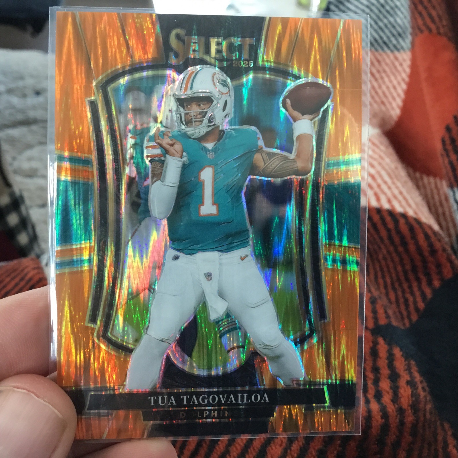 2025 Panini Select – Premier Level Tua Tagovailoa #181 Orange Shock Prizm /399