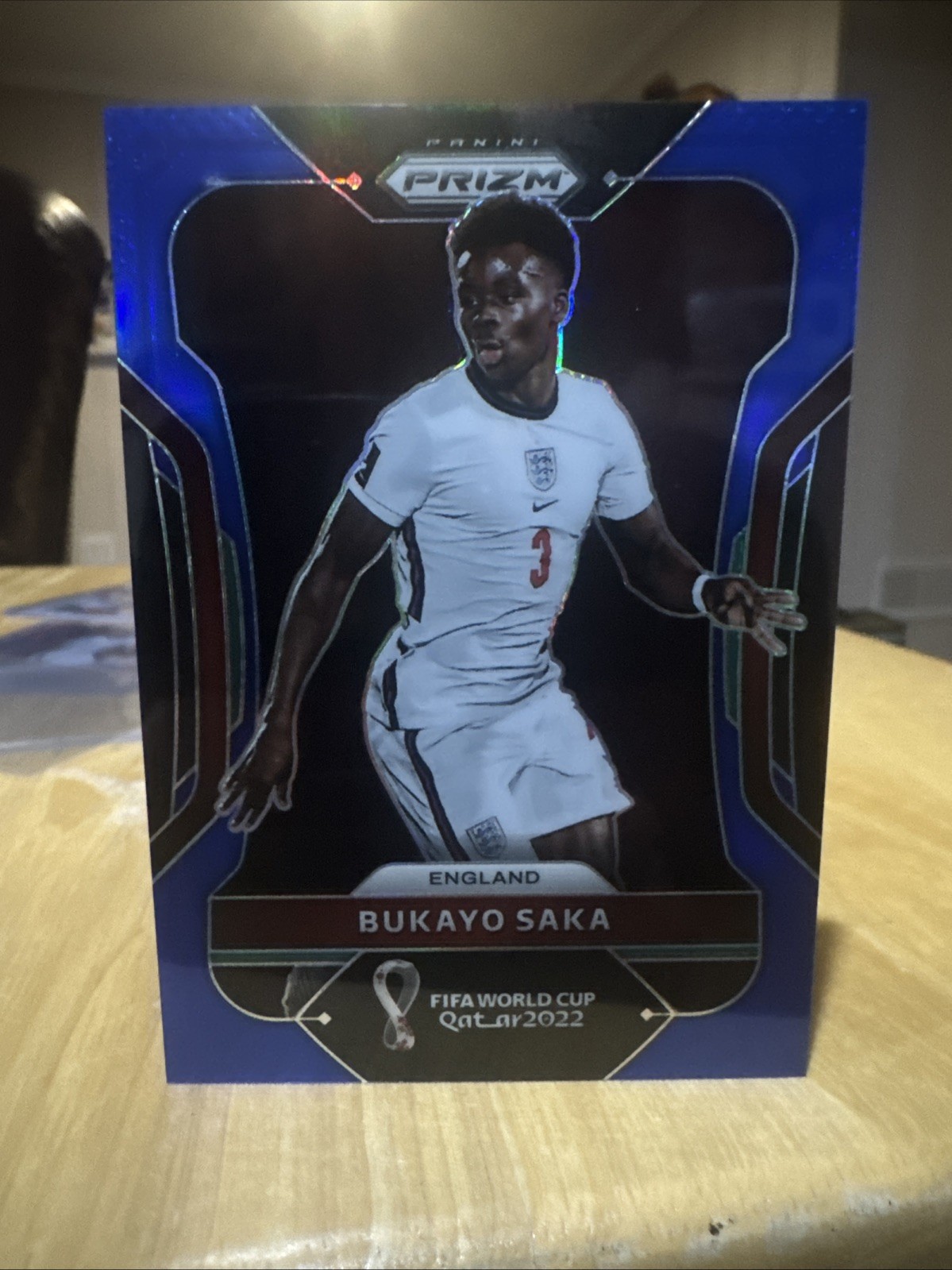 Bukayo Saka 2022 Panini Prizm FIFA World Cup Qatar Blue Prizm /299 #84