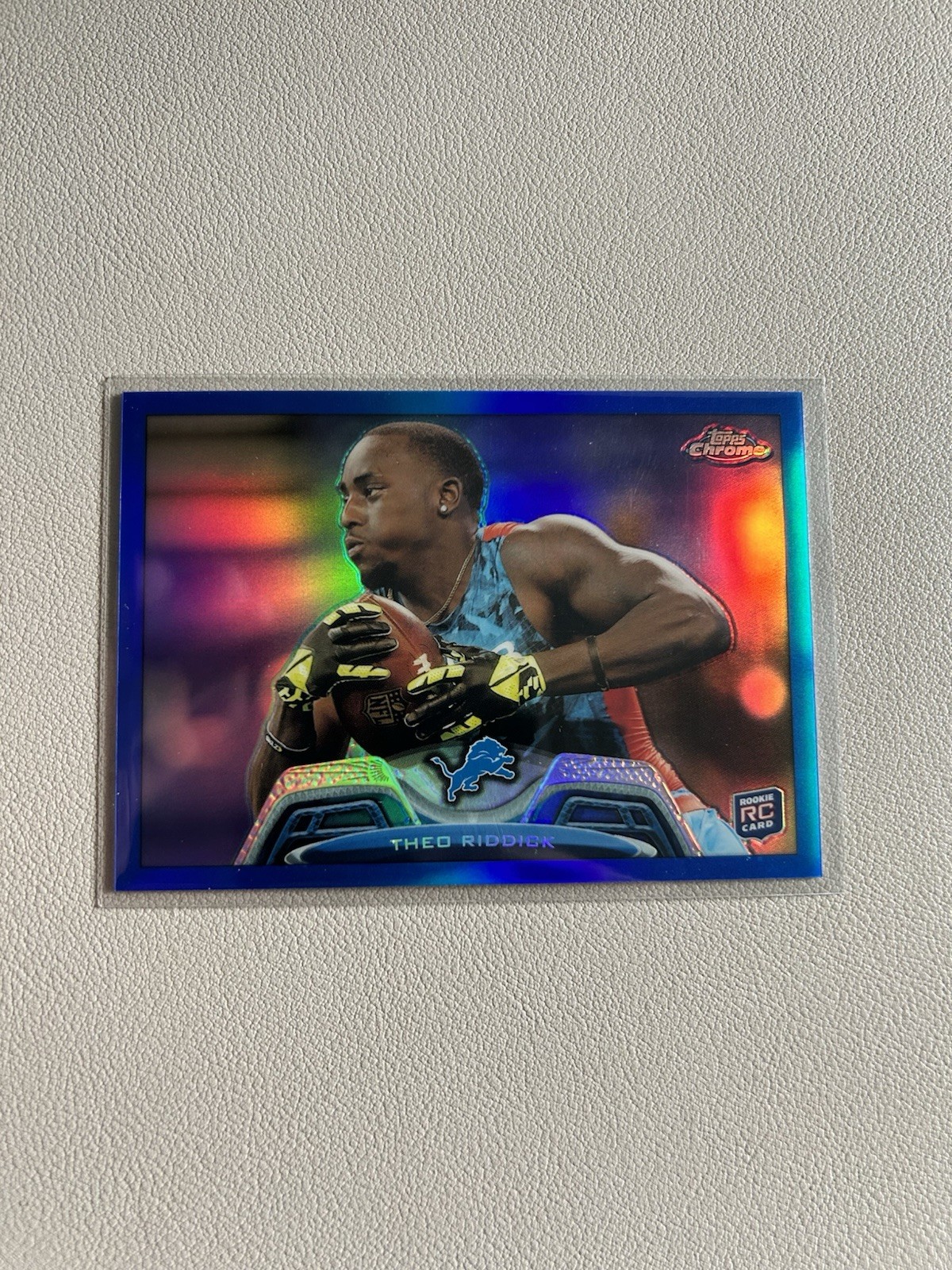 2013 Topps Chrome – Theo Riddick #93 Blue Border Refractor /199 (RC)