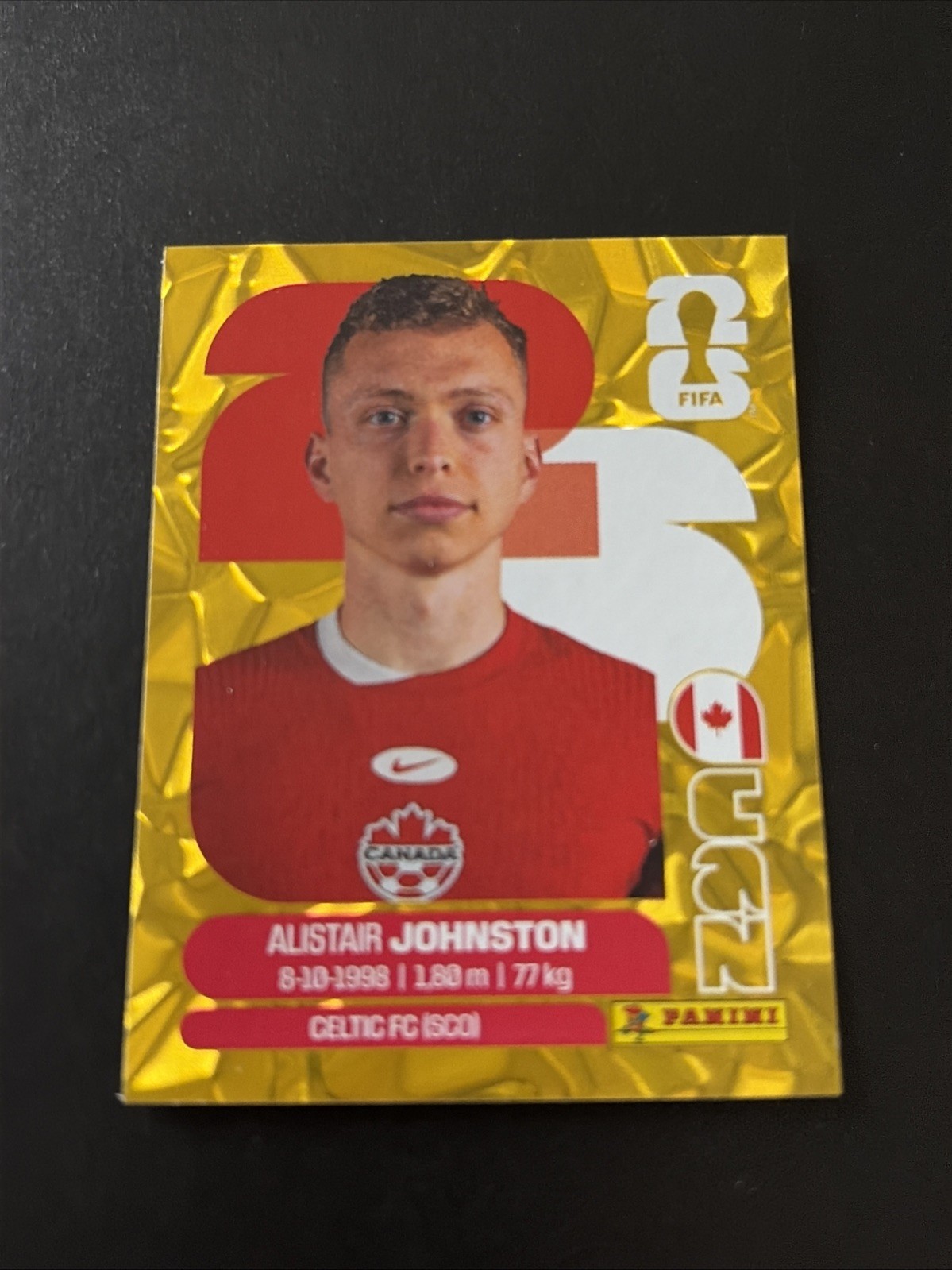 2026 Panini FIFA World Cup Sticker Gold Flood Crumple Alistair Johnston #CAN4