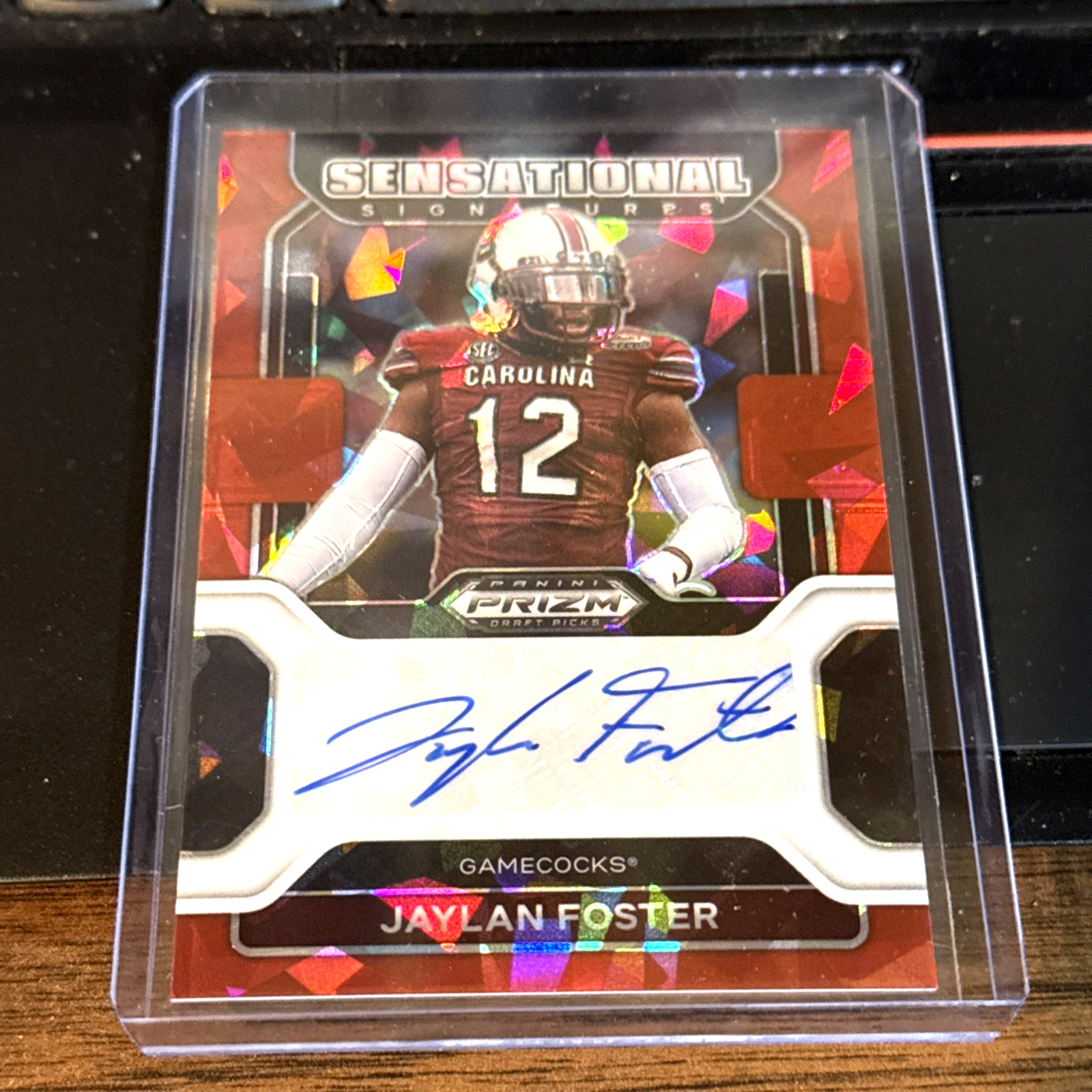 Jaylan Foster. 2022 Panini Prizm Draft Picks Red Cracked Ice #SS-JFO Autograph