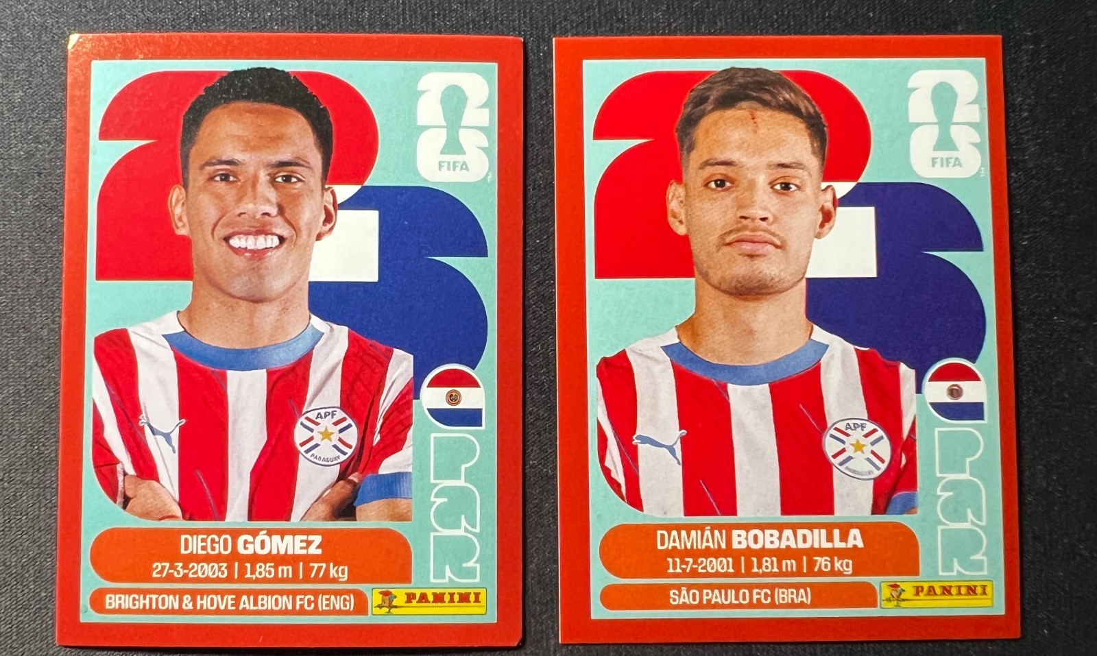 (2)2026 Panini FIFA World Cup Paraguay PAR RED Parallel Diego Gomez Bobadilla