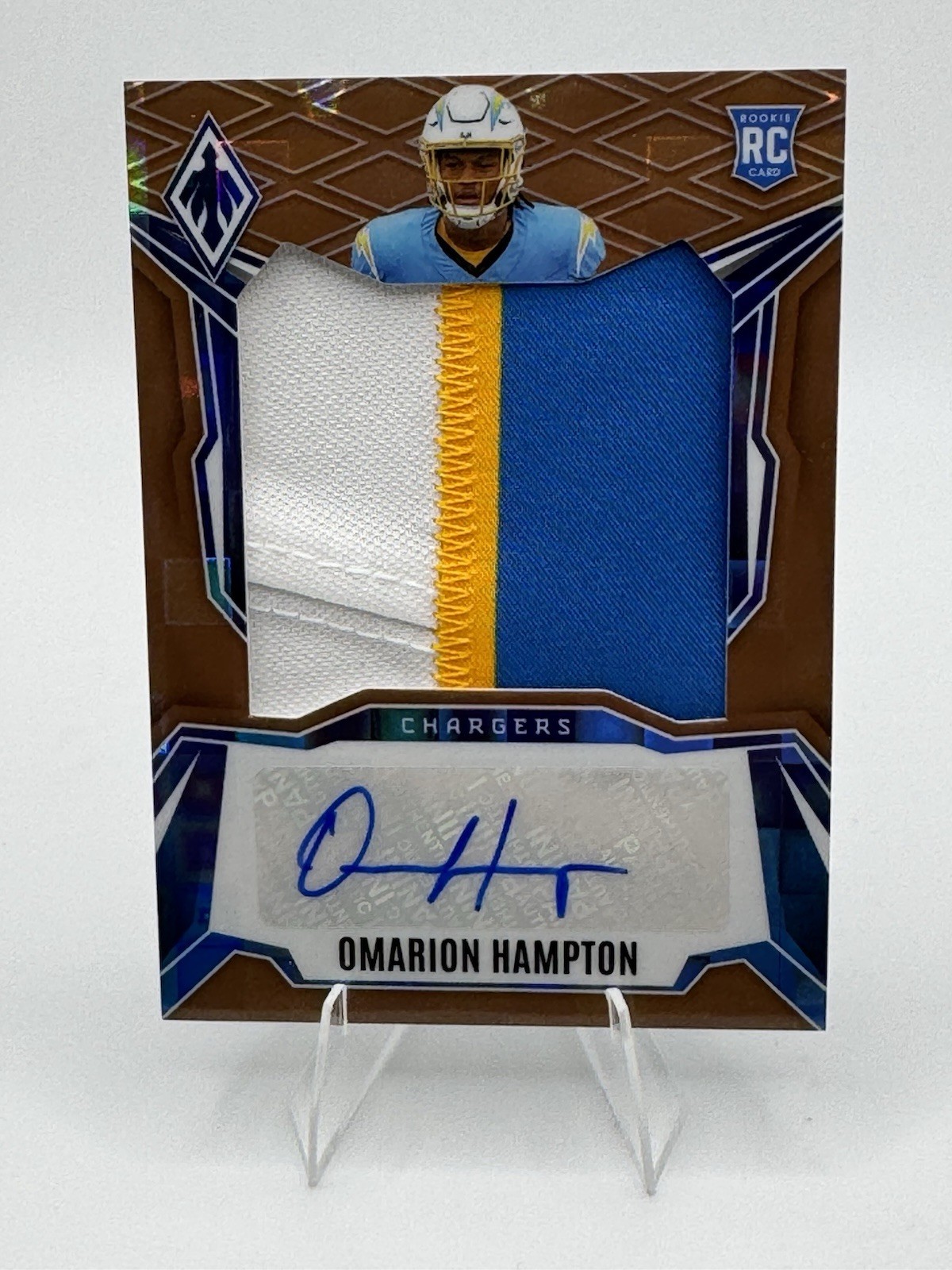Panini Phoenix 2025 Omarion Hampton RC Patch Auto DRP-OHN Bronze Pandora /199