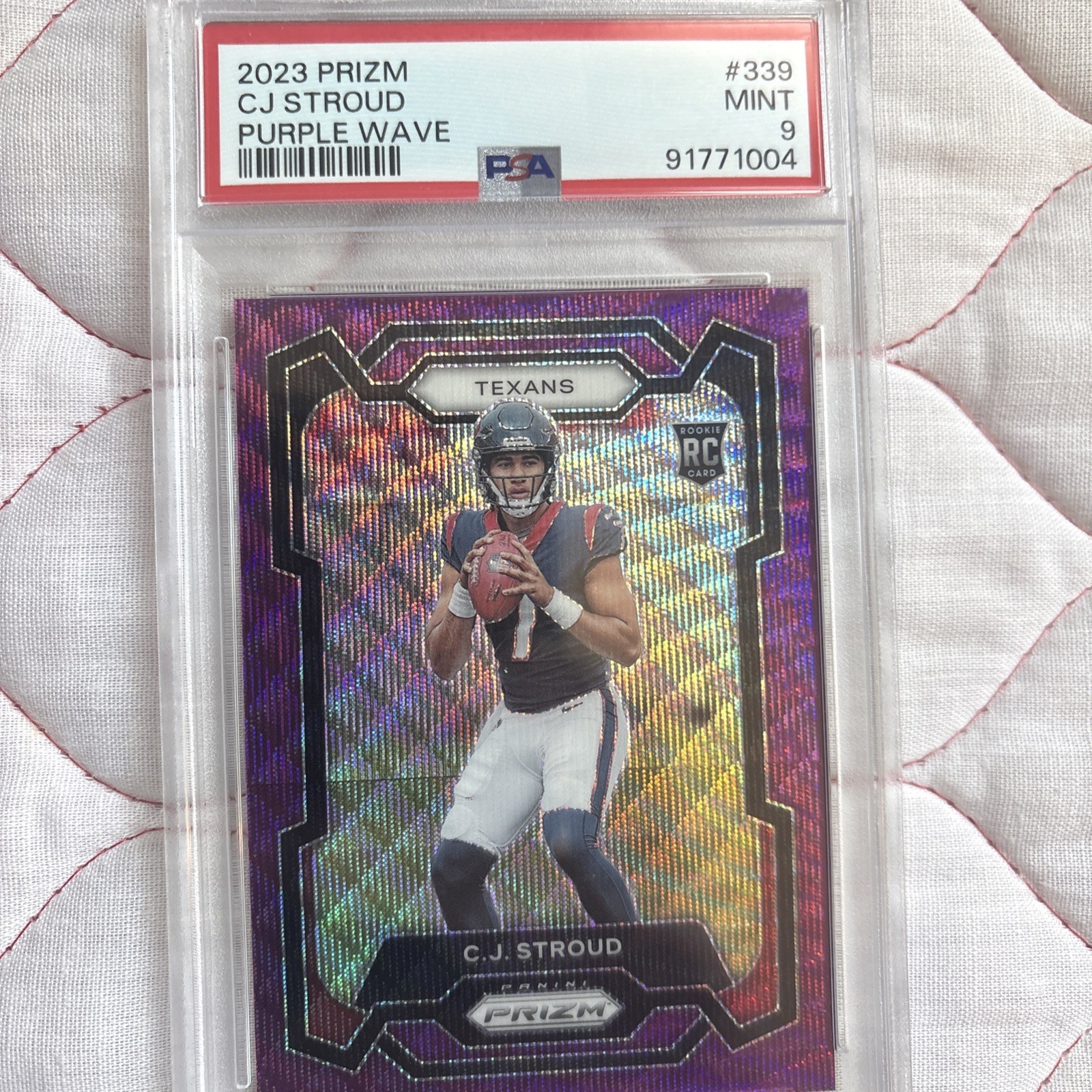 2023 Panini Prizm – Rookies C.J. Stroud #339 Purple Wave Prizm /99 (RC) PSA 9