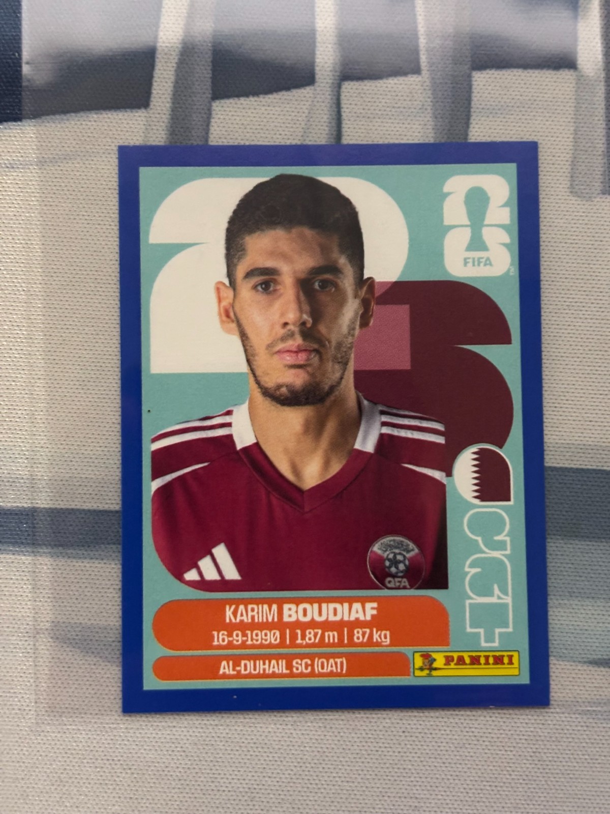 2026 Panini FIFA World Cup Karim Boudiaf QAT 10 Blue Sticker – US EDITION