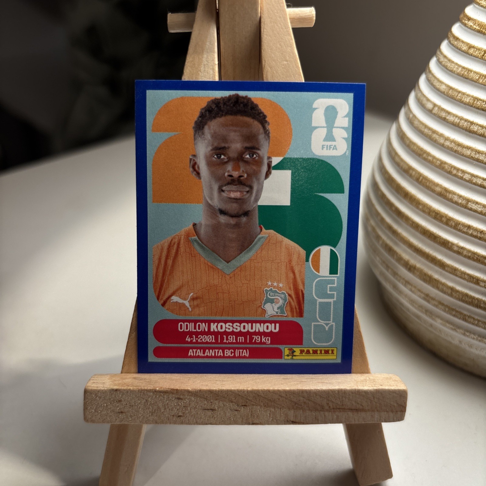 2026 Panini World Cup Sticker – Odilon KOSSOUNOU Blue Parallel/Border
