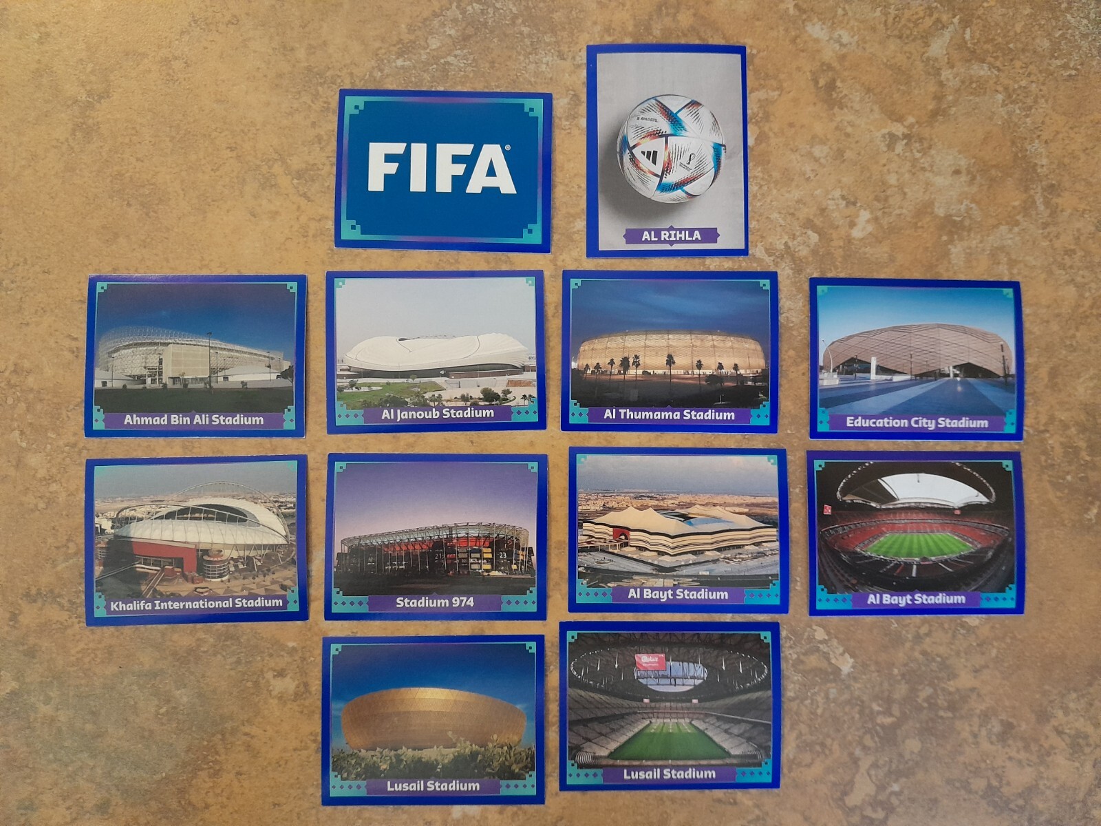2022 Panini FIFA World Cup Qatar Blue Parallel FWC to TUN Stickers