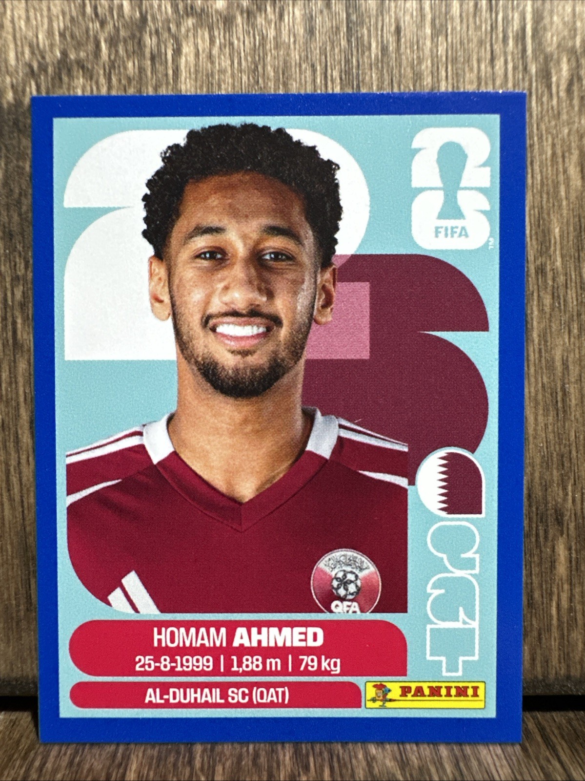 2026 Panini FIFA World Cup Sticker Homam Ahmed #QAT 5 Blue Parallel Qatar