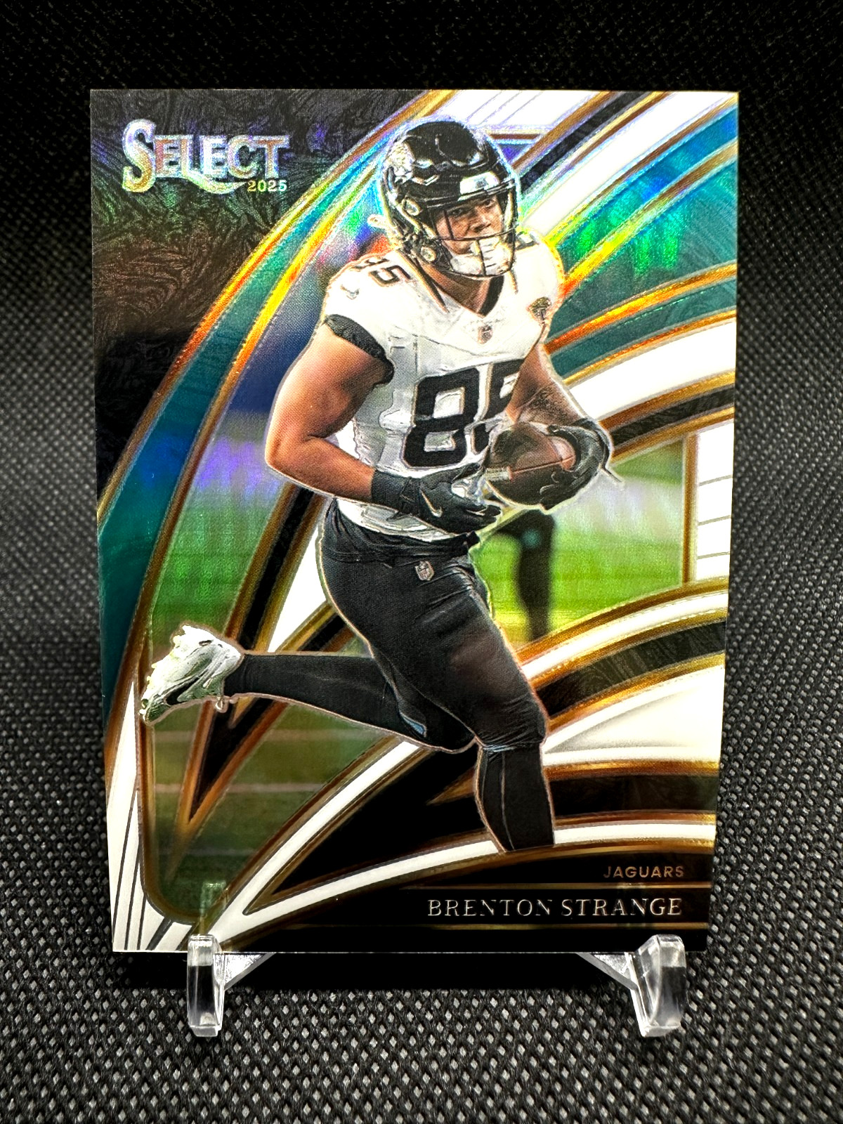 2025 Panini Select – #230 Brenton Strange Club Level White Prizm /35