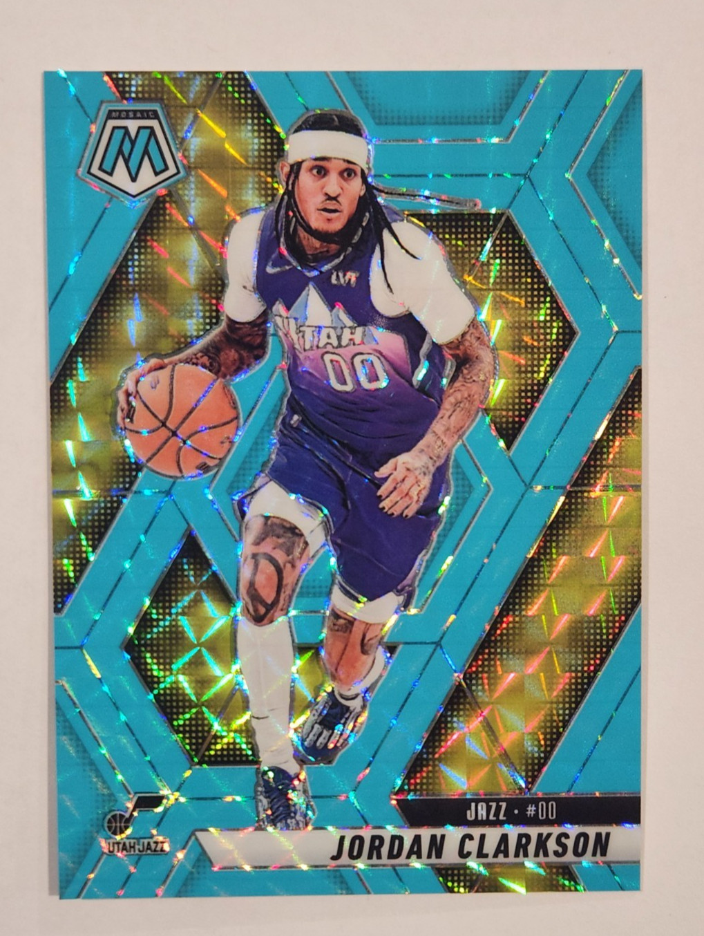 2024-25 Panini Mosaic – Jordan Clarkson #149 Fluorescent Blue Mosaic Prizm /75