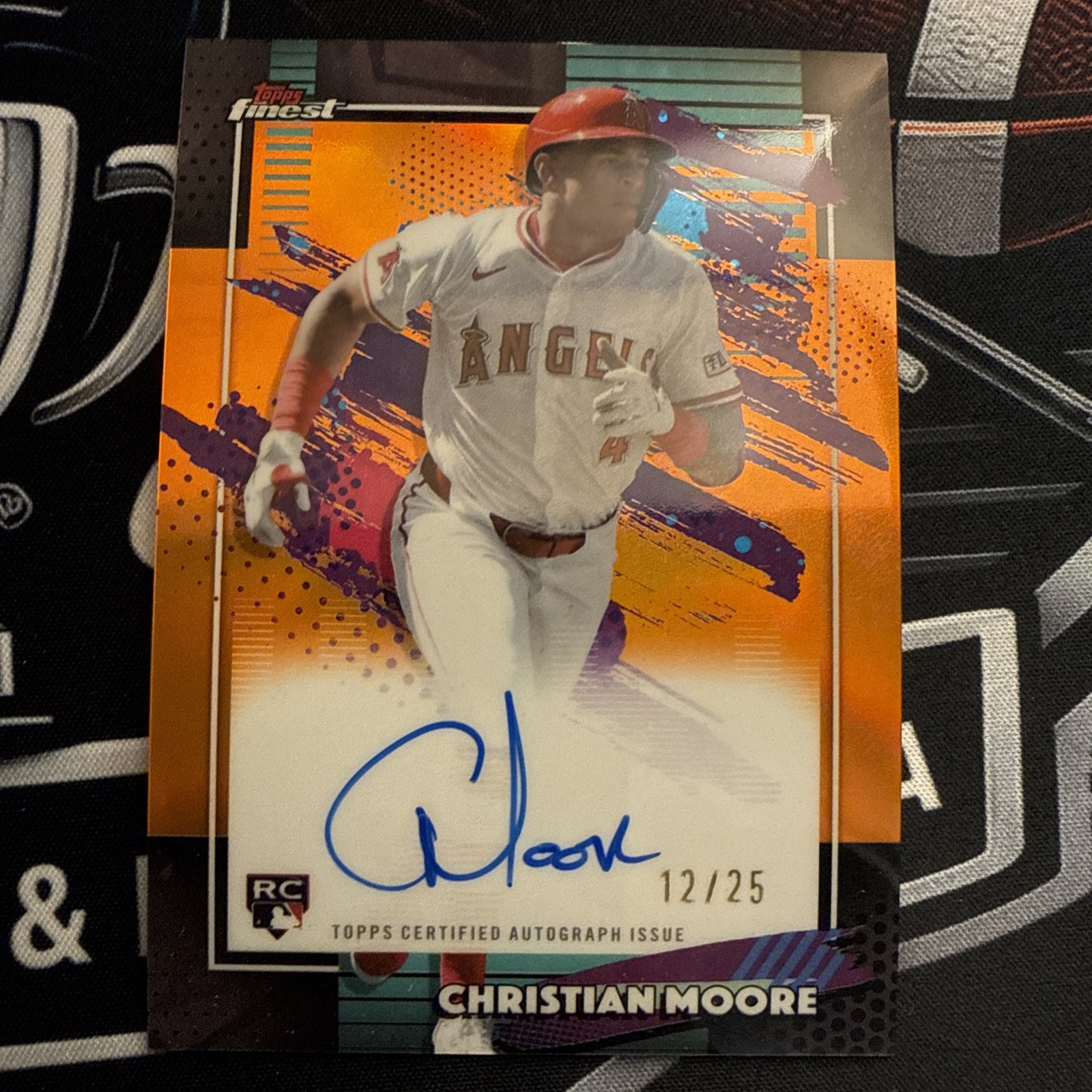 2026 Topps Finest – Christian Moore RC Orange Auto Gold 12/25 FA-CME – LA Angels