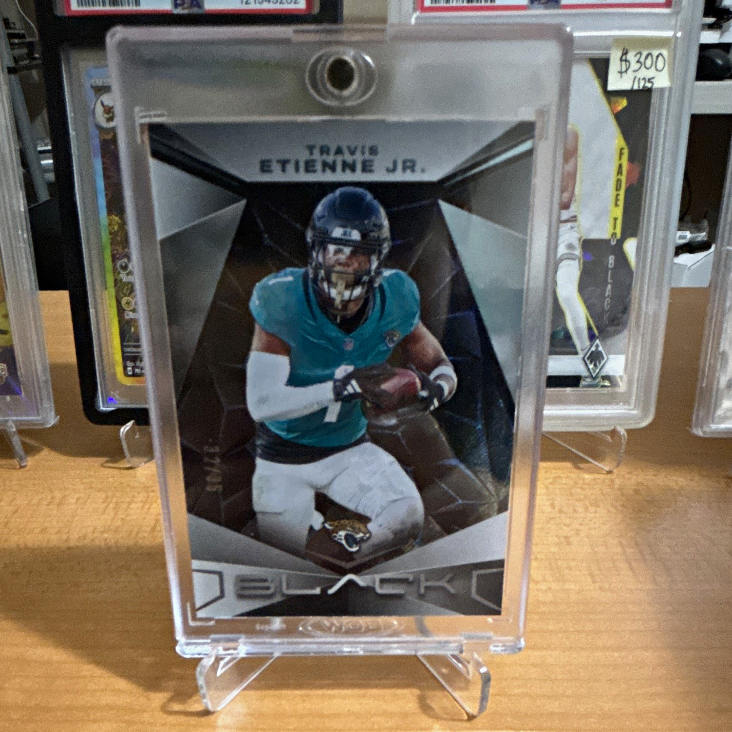 Panini 2024 Black Travis Etienne Jr. /35 Sparkle #51 Jacksonville Jaguars