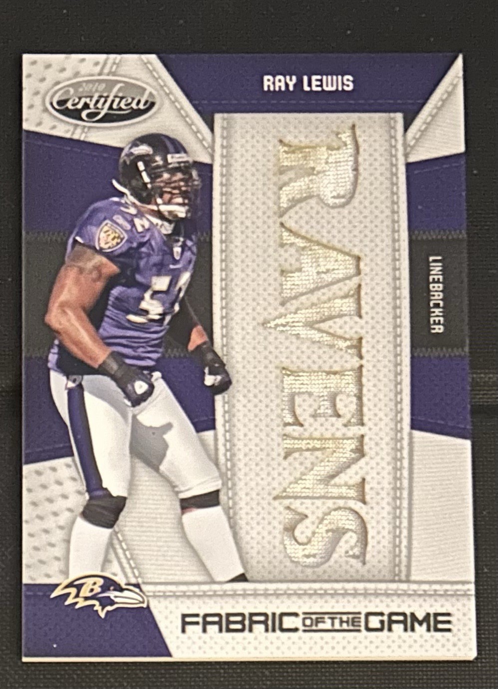 2010 Certified Fabric of the Game Die-Cut Team Name /25 Ray Lewis #117 Game Used