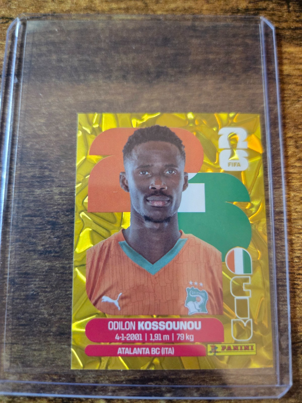 2026 Panini FIFA World Cup Stickers – Odilon Kossounou Gold Crumple #CIV 5