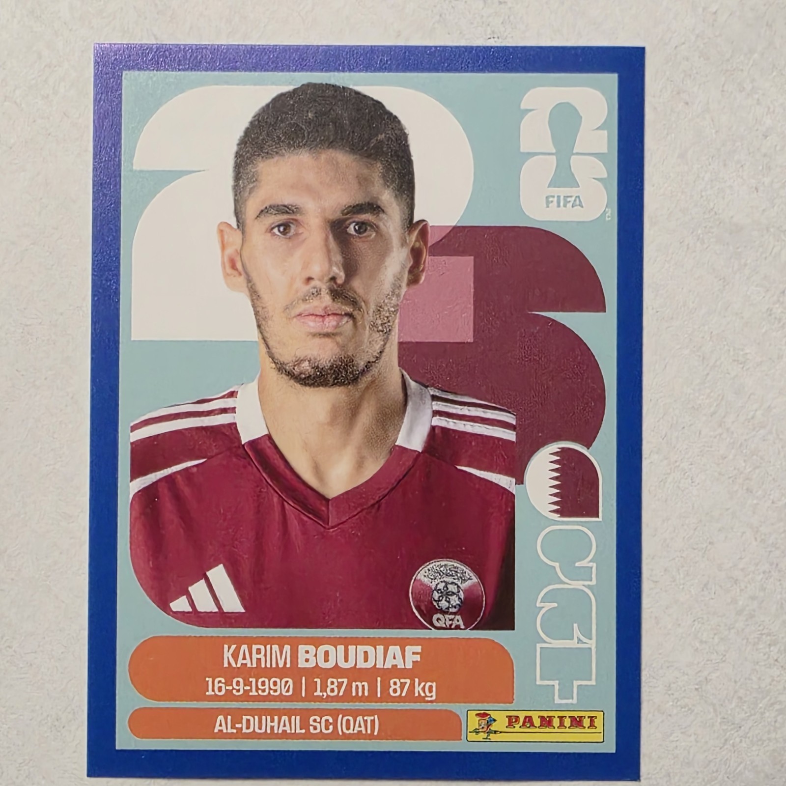 Karim Boudiaf 2026 Panini FIFA World Cup Sticker Blue Parallel #QAT 10