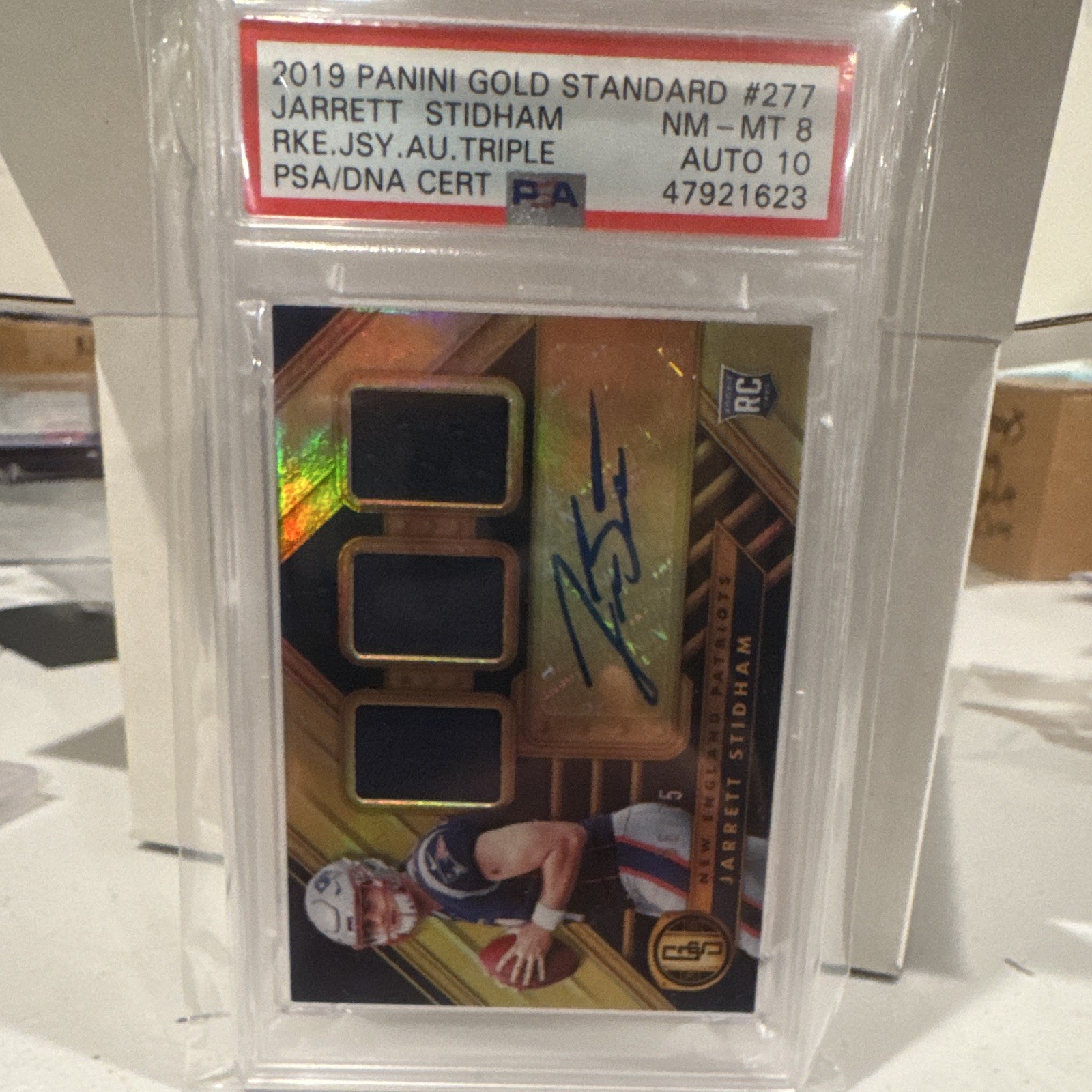Panini Gold Standard Jarrett Stidham #277 Rookie Jersey Auto Triple /75 PSA 8