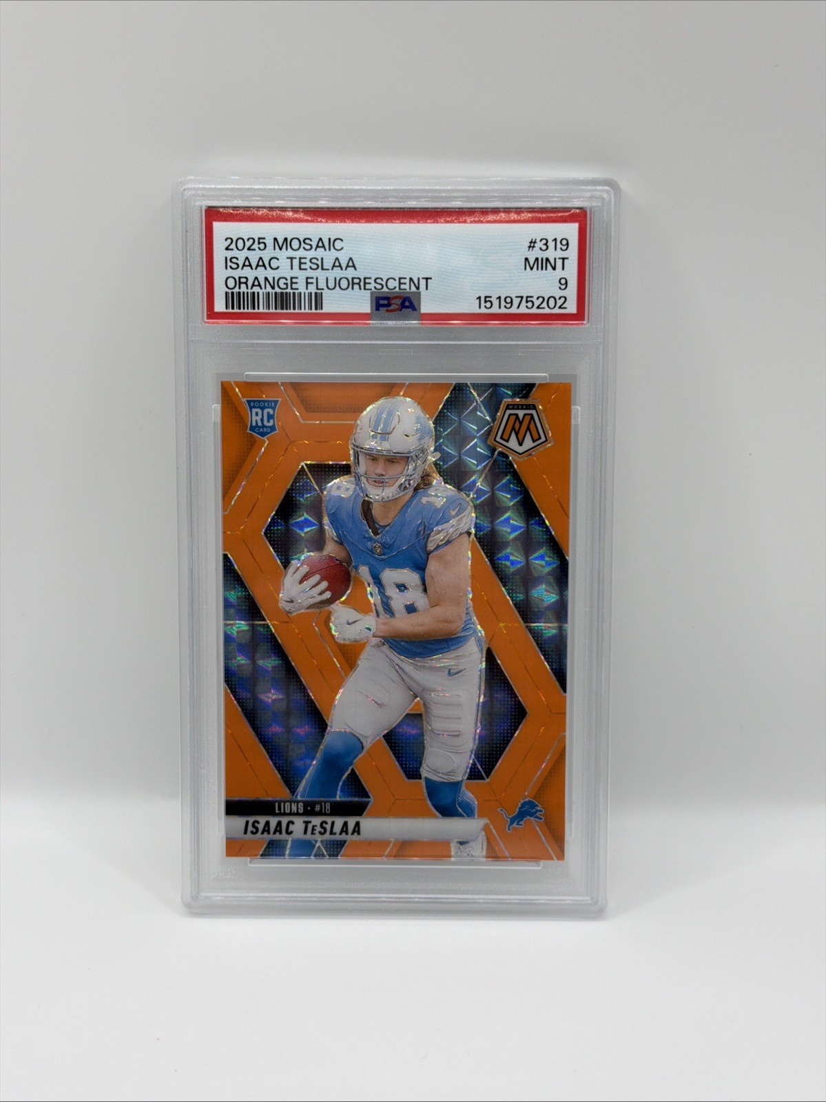 2025 Panini Mosaic – Rookies Isaac Teslaa #319 Orange Mosaic Prizm /25 (RC)