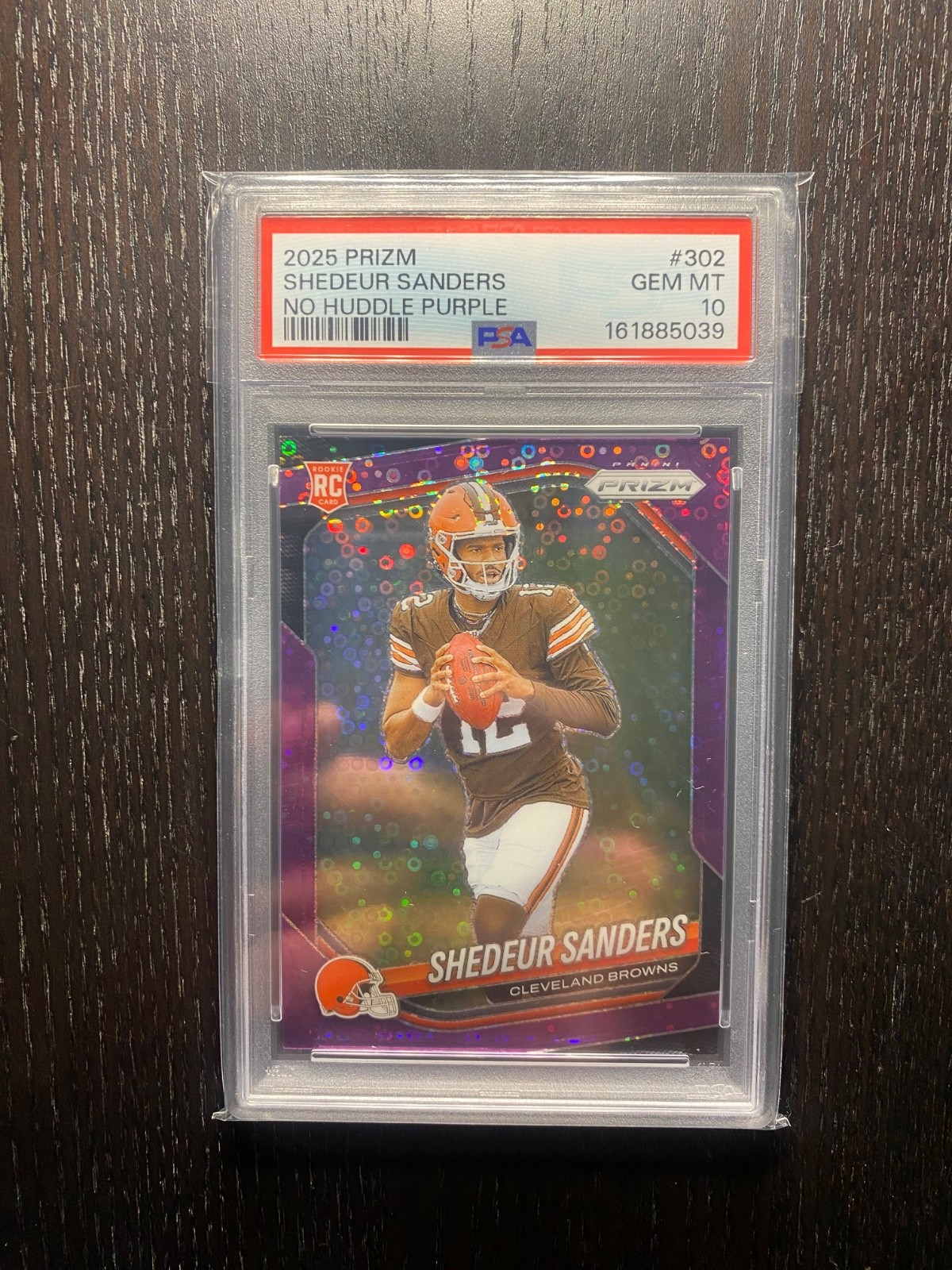 Shedeur Sanders RC 2025 Panini Prizm #302 Purple No Huddle Prizm /75 PSA 10