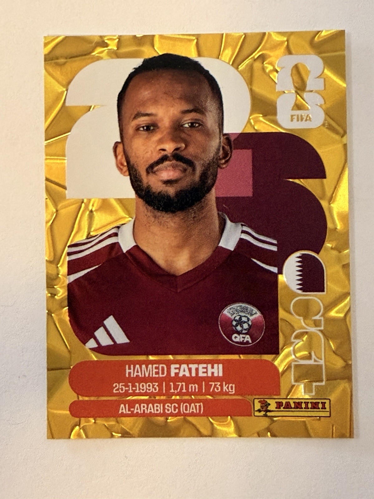 Hamed Fatehi Gold Crumple 2026 Panini World Cup Sticker Qatar #QAT 12