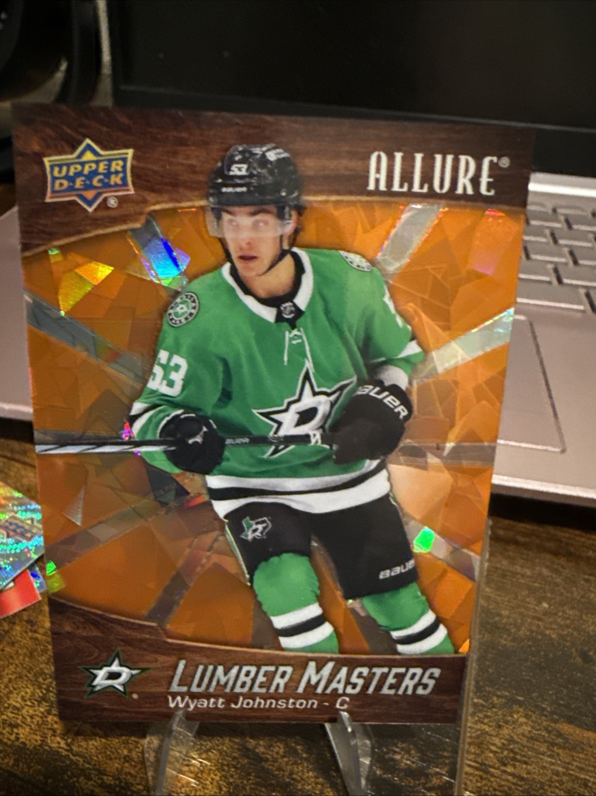 2023-24 Upper Deck Allure Lumber Masters Orange /399 Wyatt Johnston #LM-14