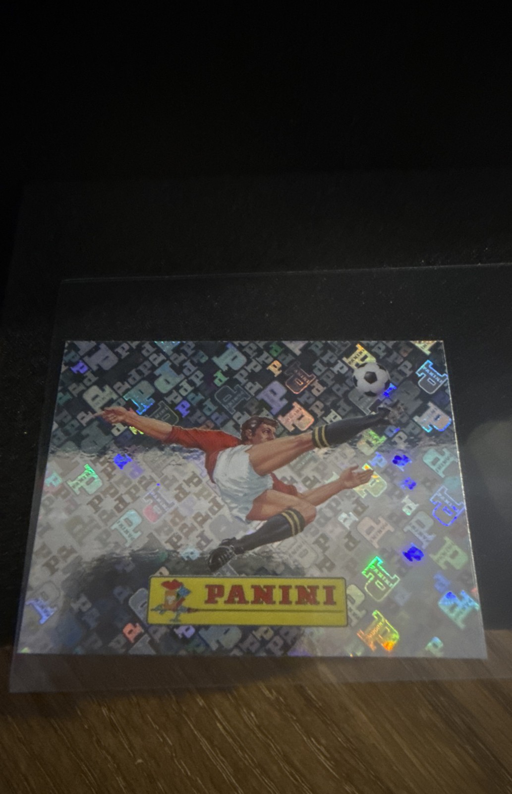 2026 Panini FIFA World Cup Stickers #00 Panini Logo Holographic Foil