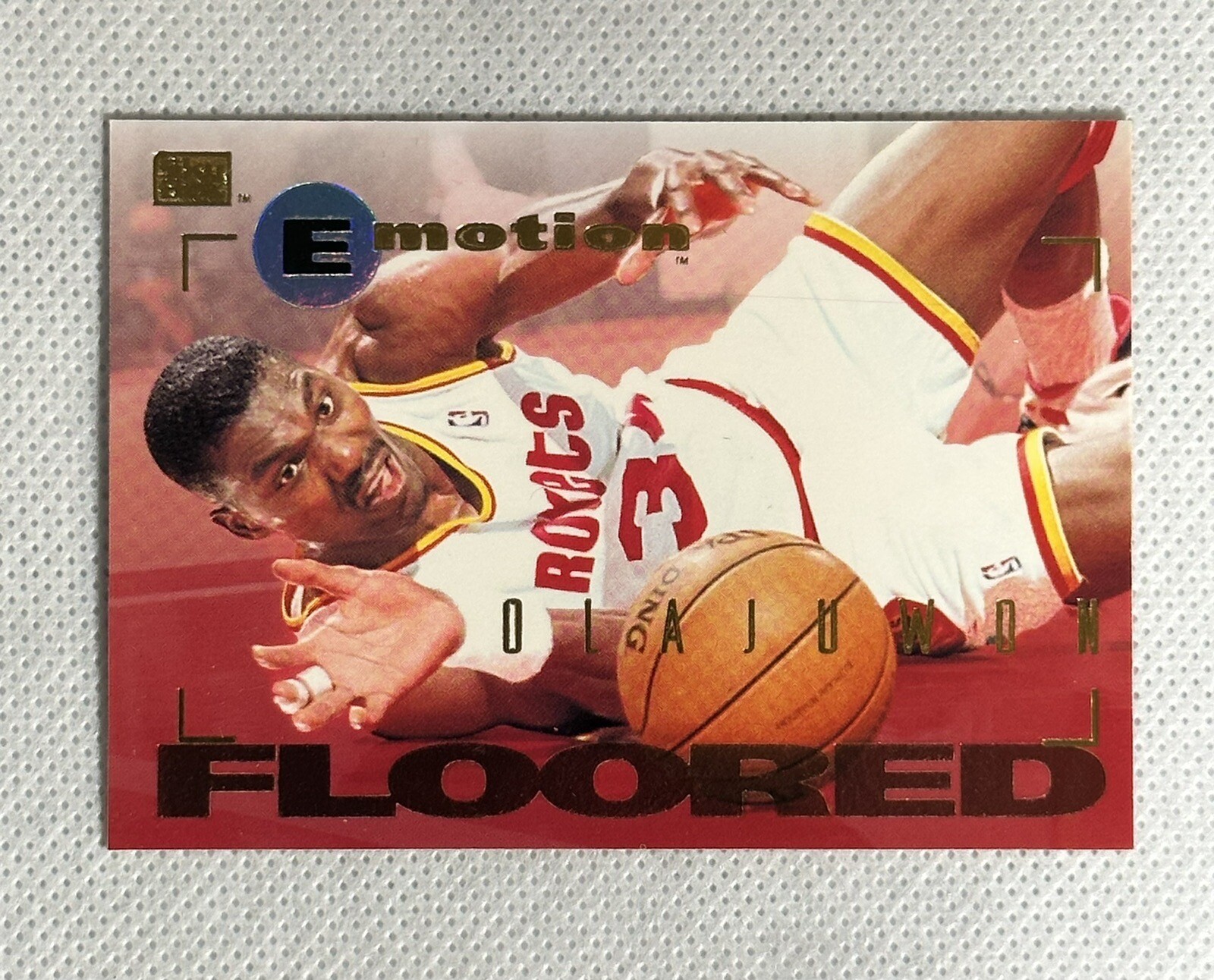 1994-95 SkyBox Emotion Hakeem Olajuwon #38 Basketball Card Houston Rockets