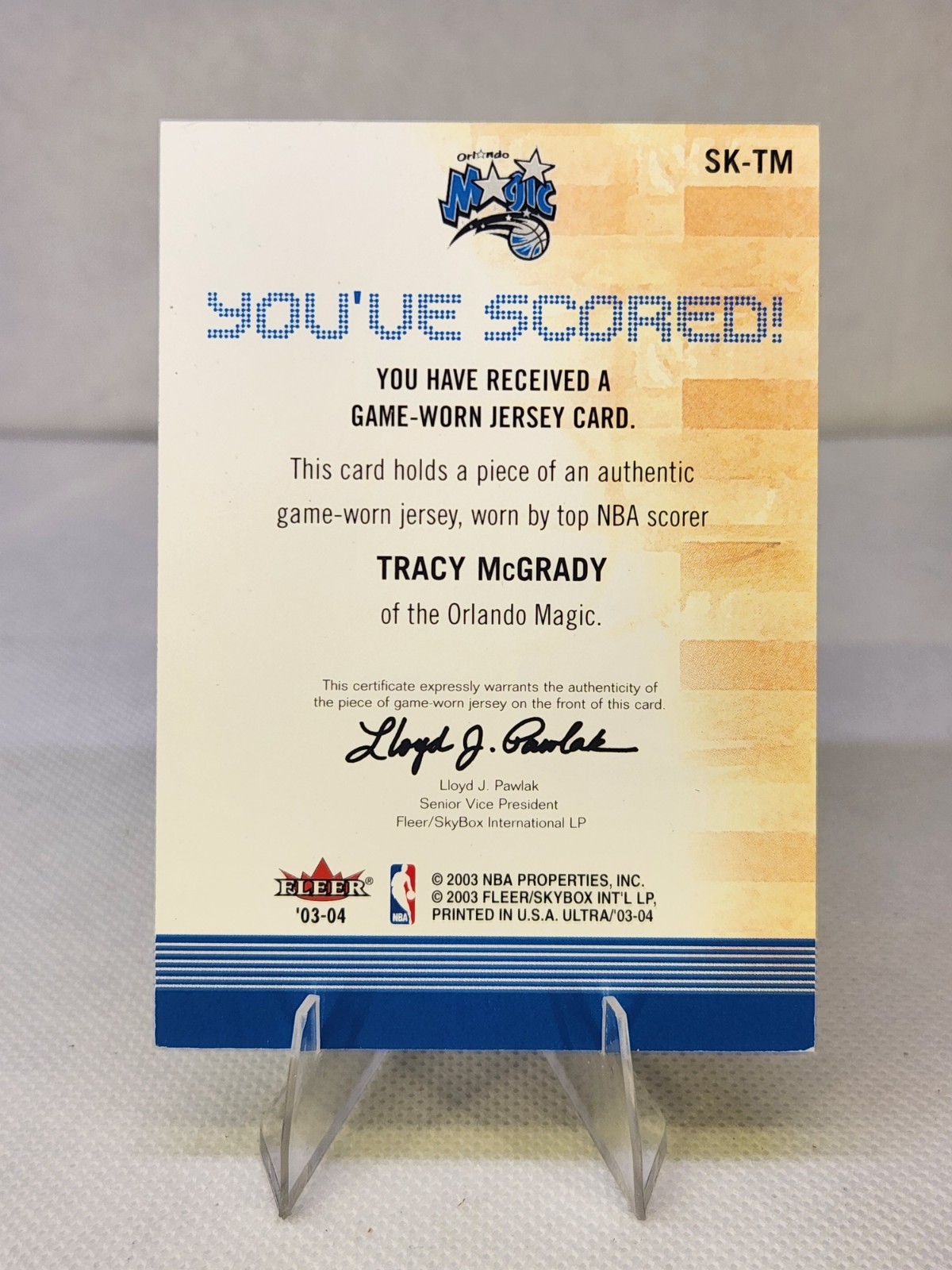 2003-04 Fleer Ultra – Scoring Kings Tracy McGrady #SK-TM Game Used Patch