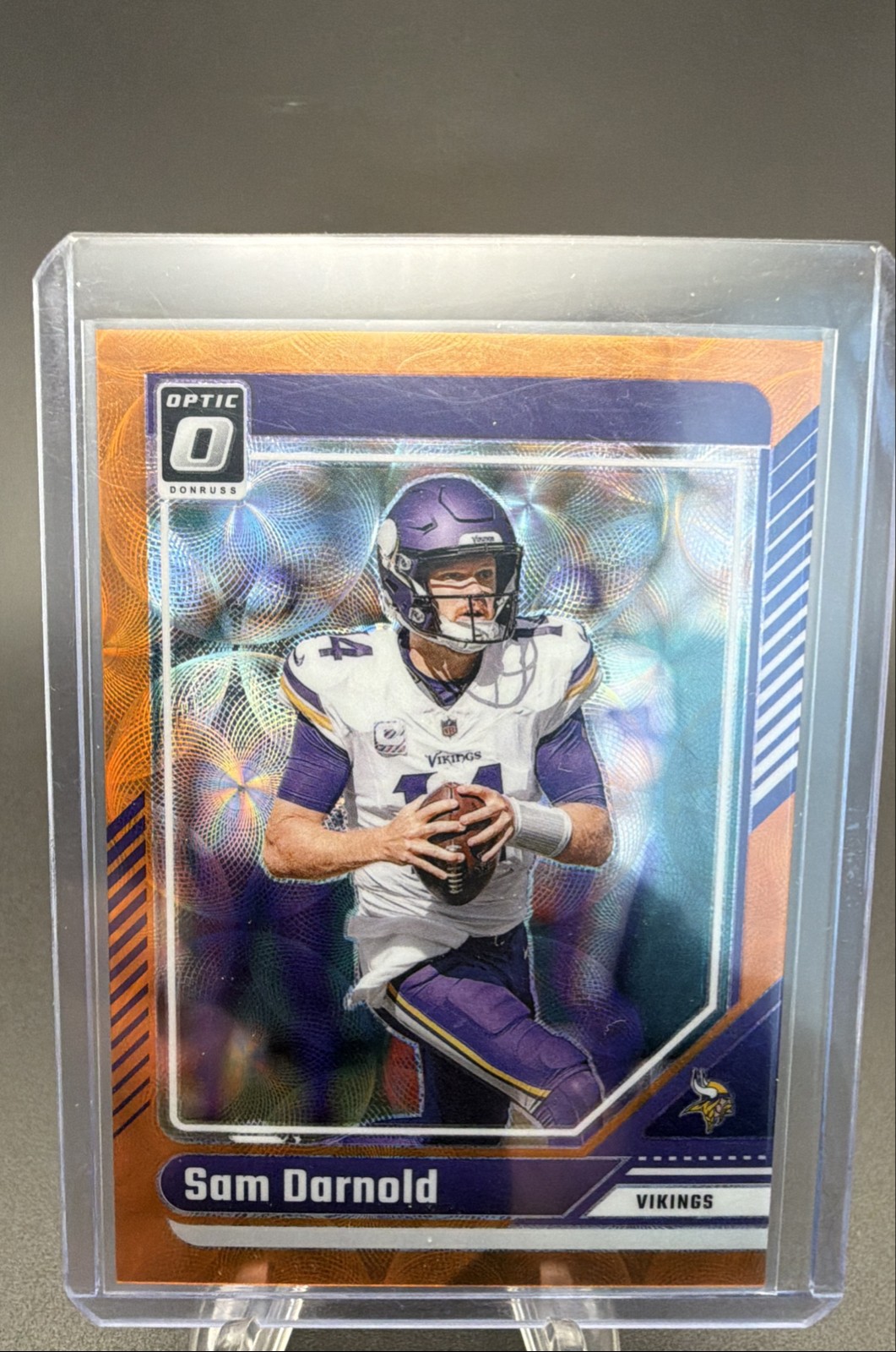2024 Panini Donruss Optic – Sam Darnold #127 Orange Scope Prizm /79