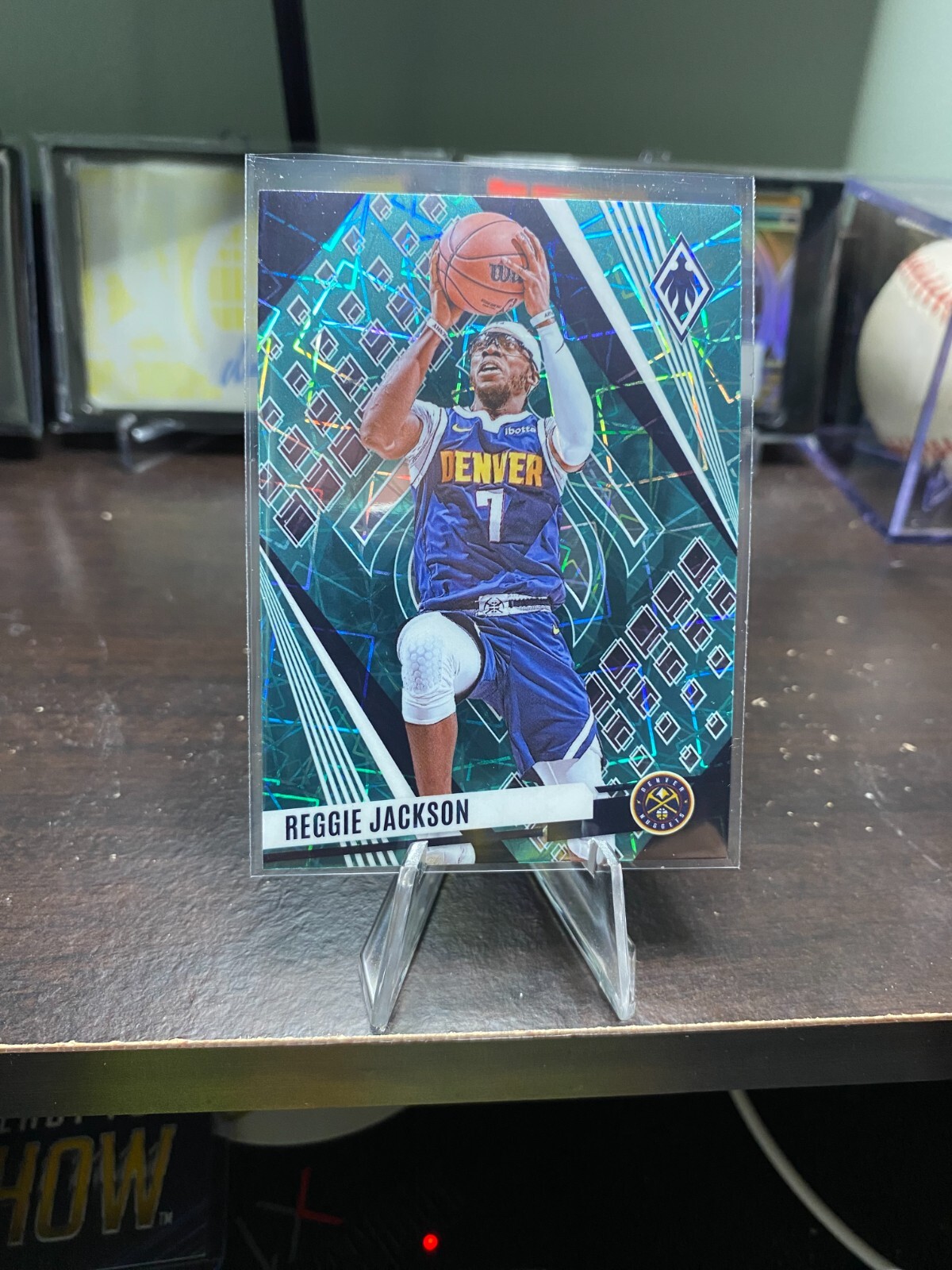 2023-24 Panini Phoenix – Reggie Jackson #28 Teal Lazer Phoenix
