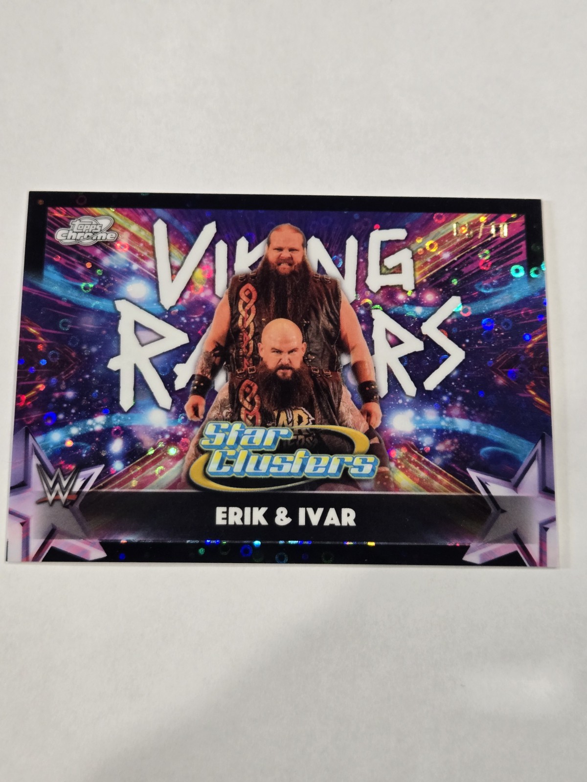 2026 Topps Cosmic Chrome WWE Erik Ivar Star Clusters Black Refractor #/10