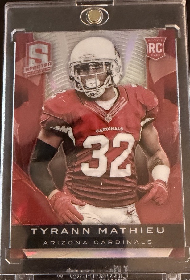 2013 Panini Spectra – Rookie Tyrann Mathieu #250 Red /25 (RC)