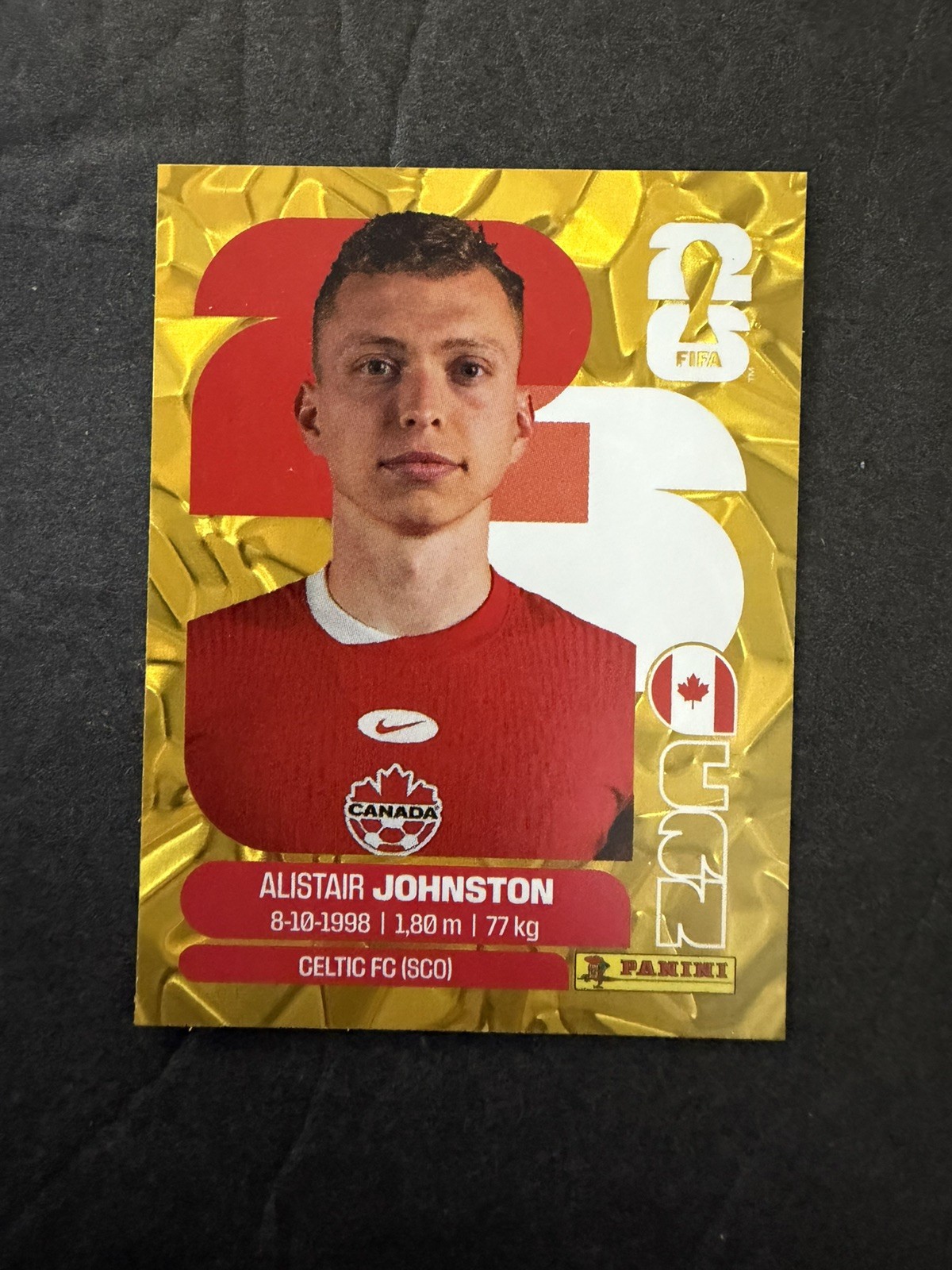 2026 Panini FIFA World Cup Sticker Gold Flood Crumple Alistair Johnston #CAN4