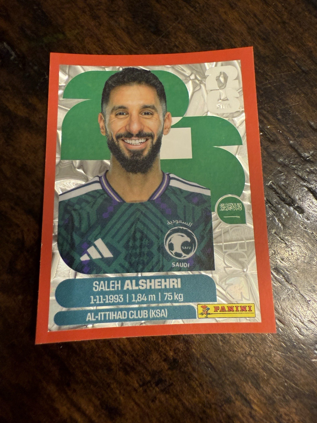 2026 Panini FIFA World Cup Sticker Saleh Alshehri #KSA 19 – Red Crumble