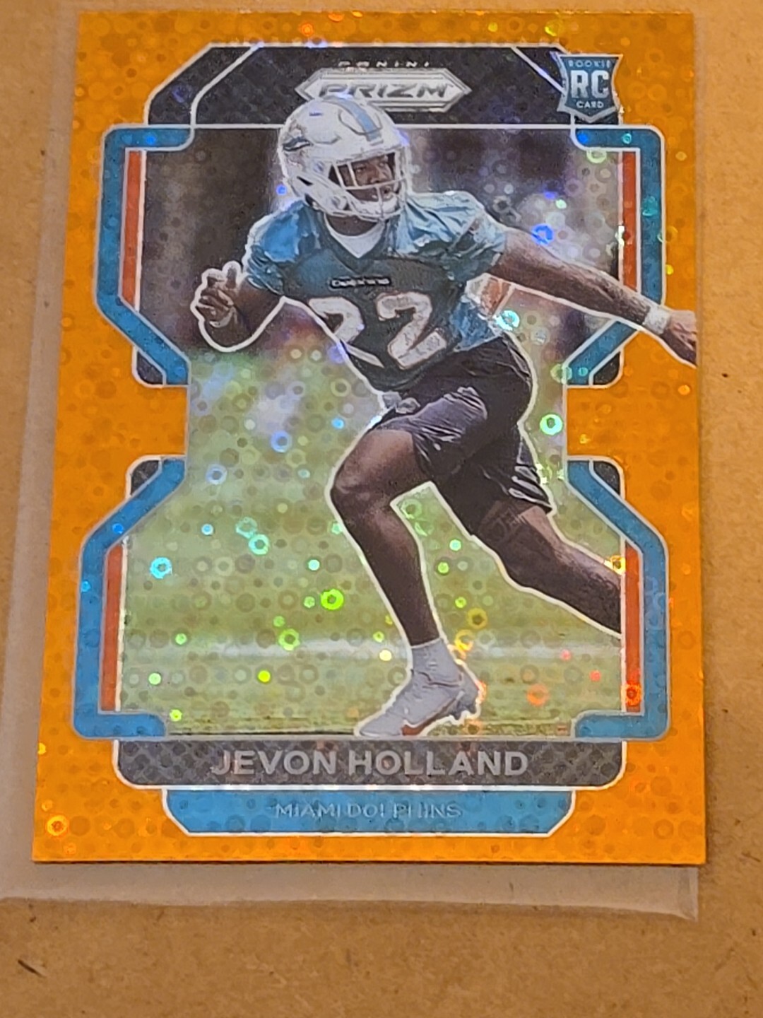 2021 Panini Prizm #392 Jevon Holland Orange Disco Prizm RC Dolphins