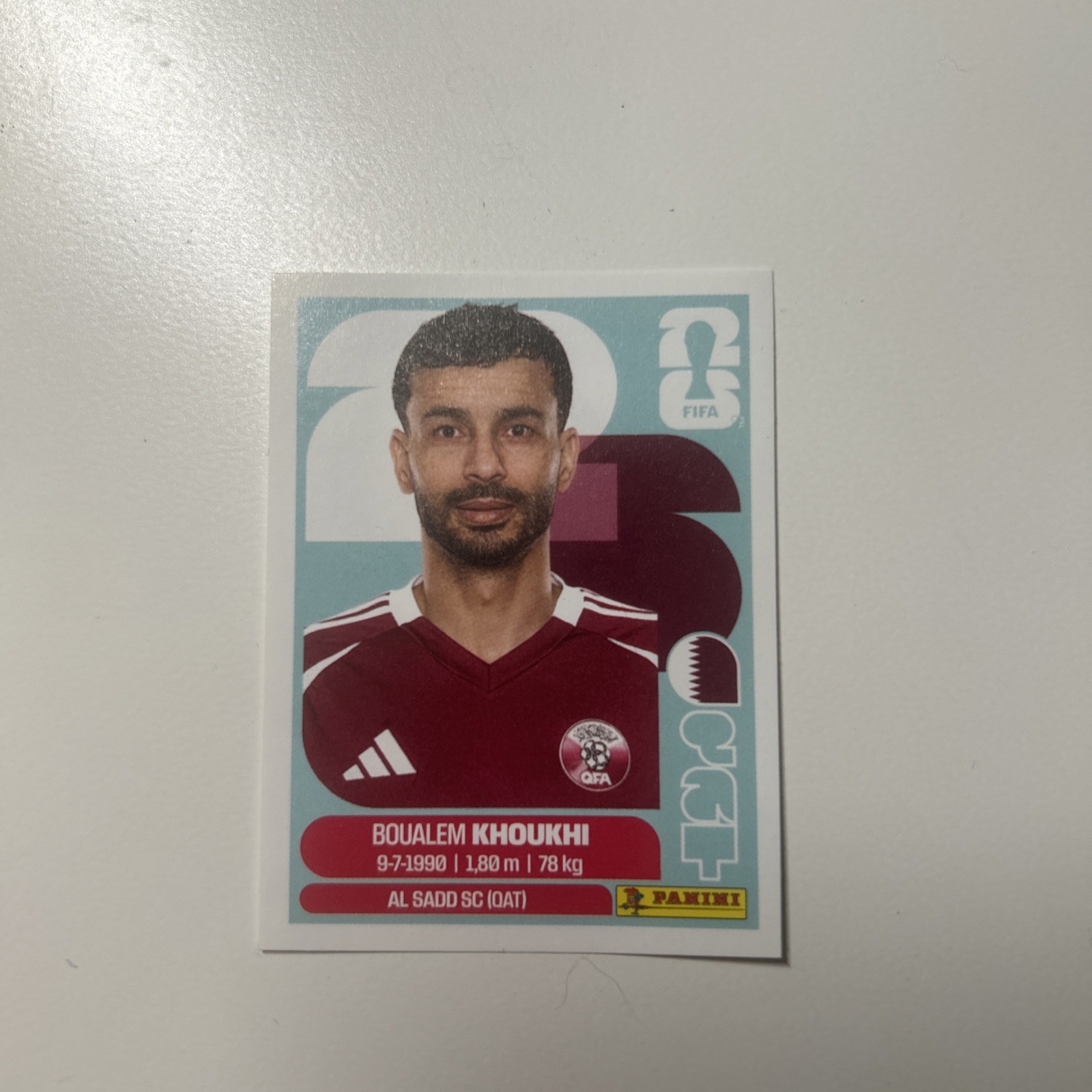 2026 Panini FIFA World Cup Boualem Khoukhi QAT6 Sticker