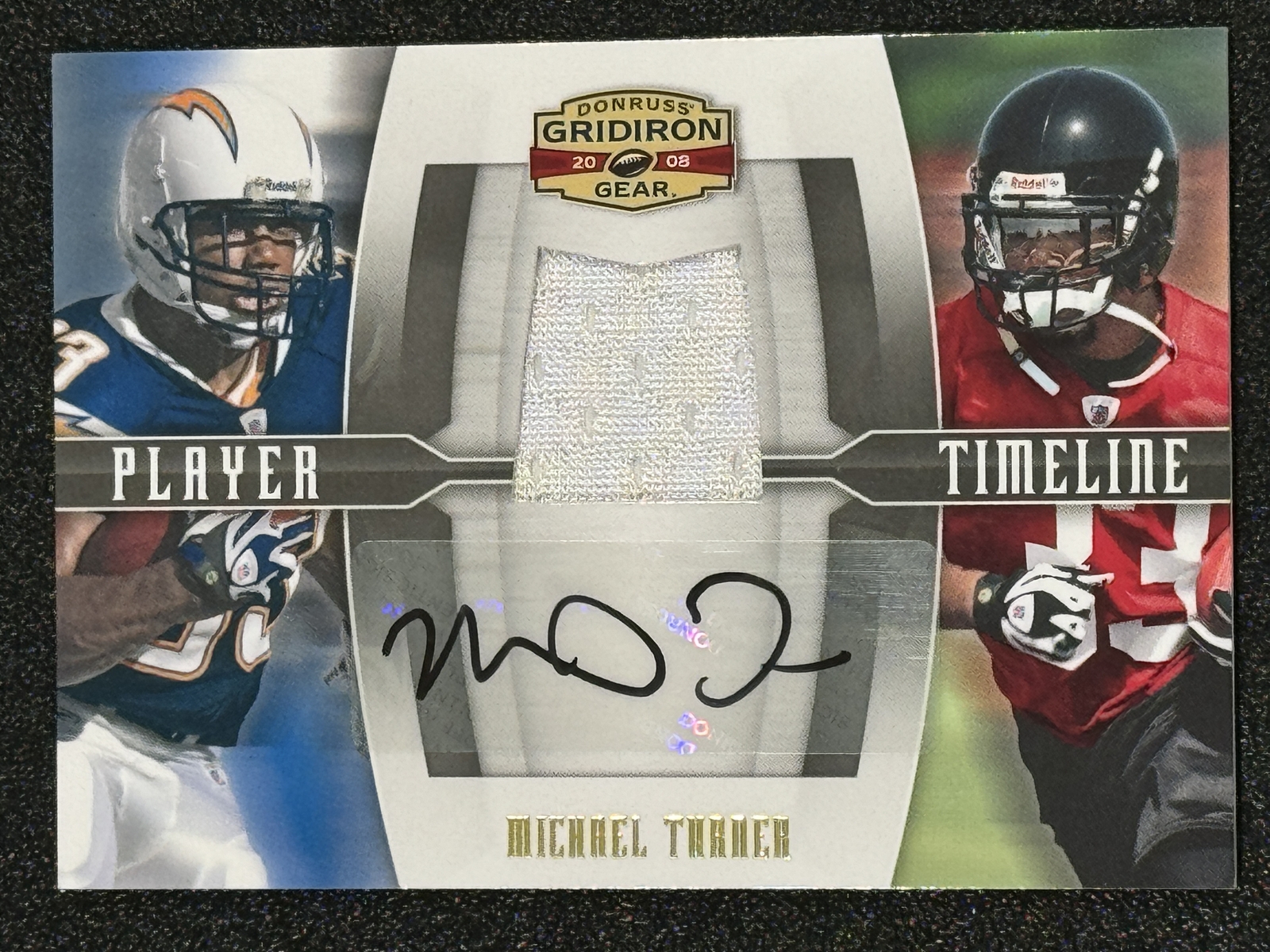 2008 Donruss Gridiron Gear #PT-20 Michael Turner Player T-line Jersey Auto #/50