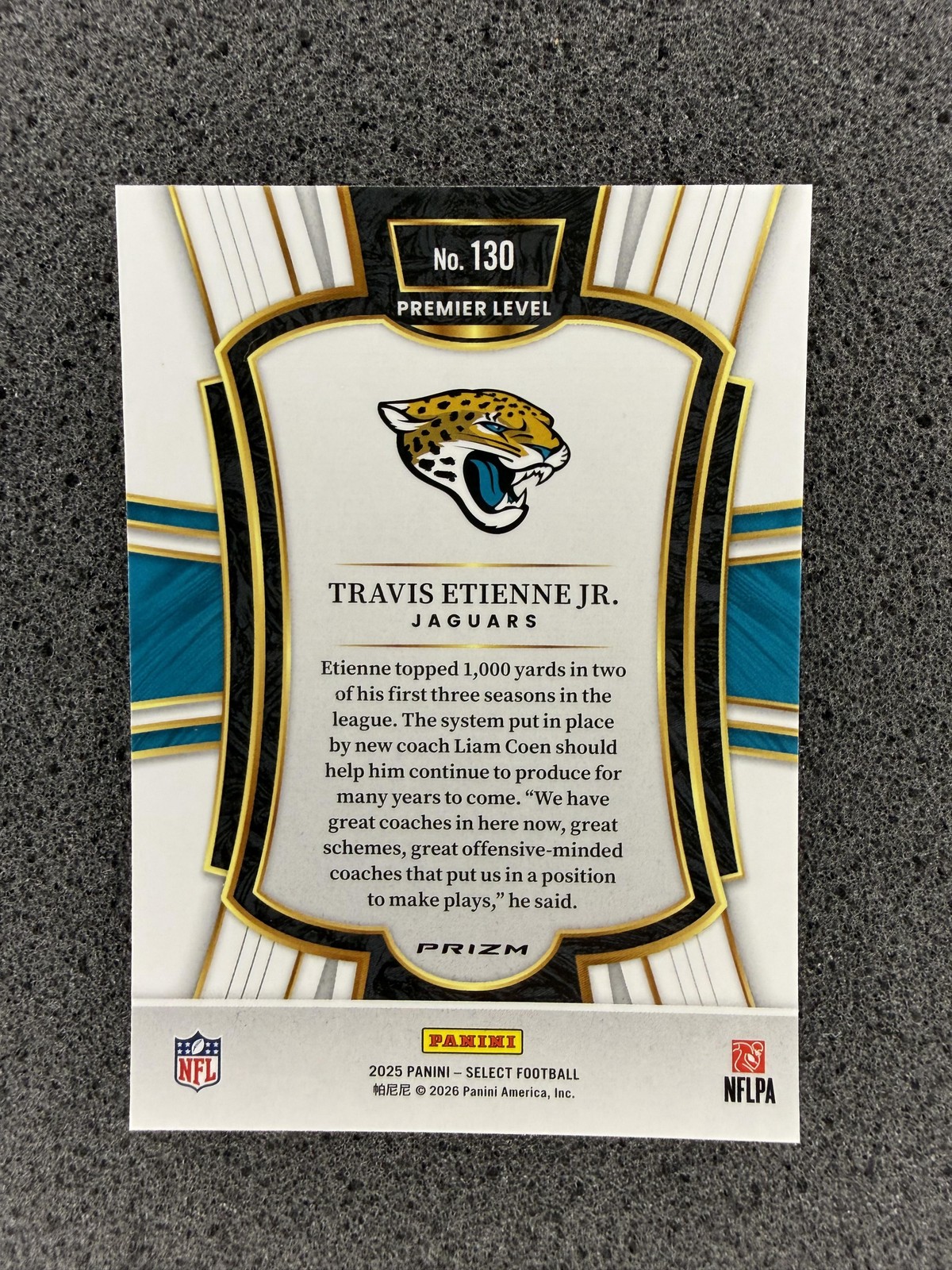 2025 Panini Select #130 Travis Etienne Jr. Black and Gold Prizm Shock