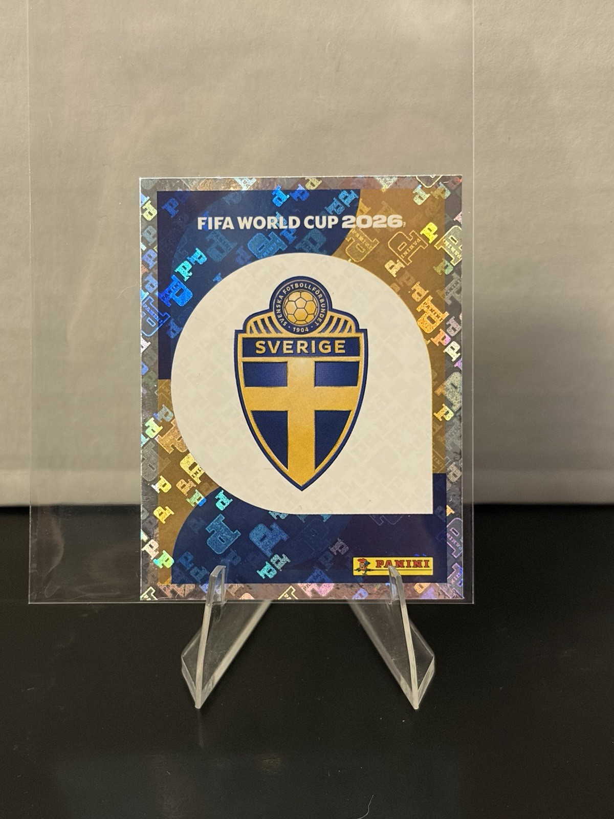 2026 Panini FIFA World Cup Stickers – Sweden Team Logo Badge Foil #SWE 1