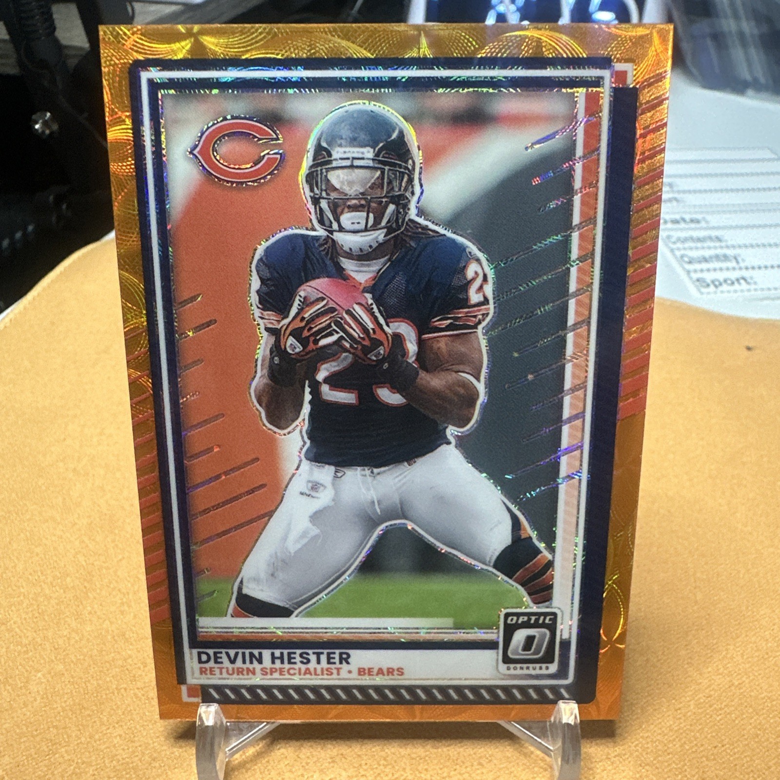 2025 Panini Donruss Optic – Devin Hester #43 Orange Scope Prizm /79