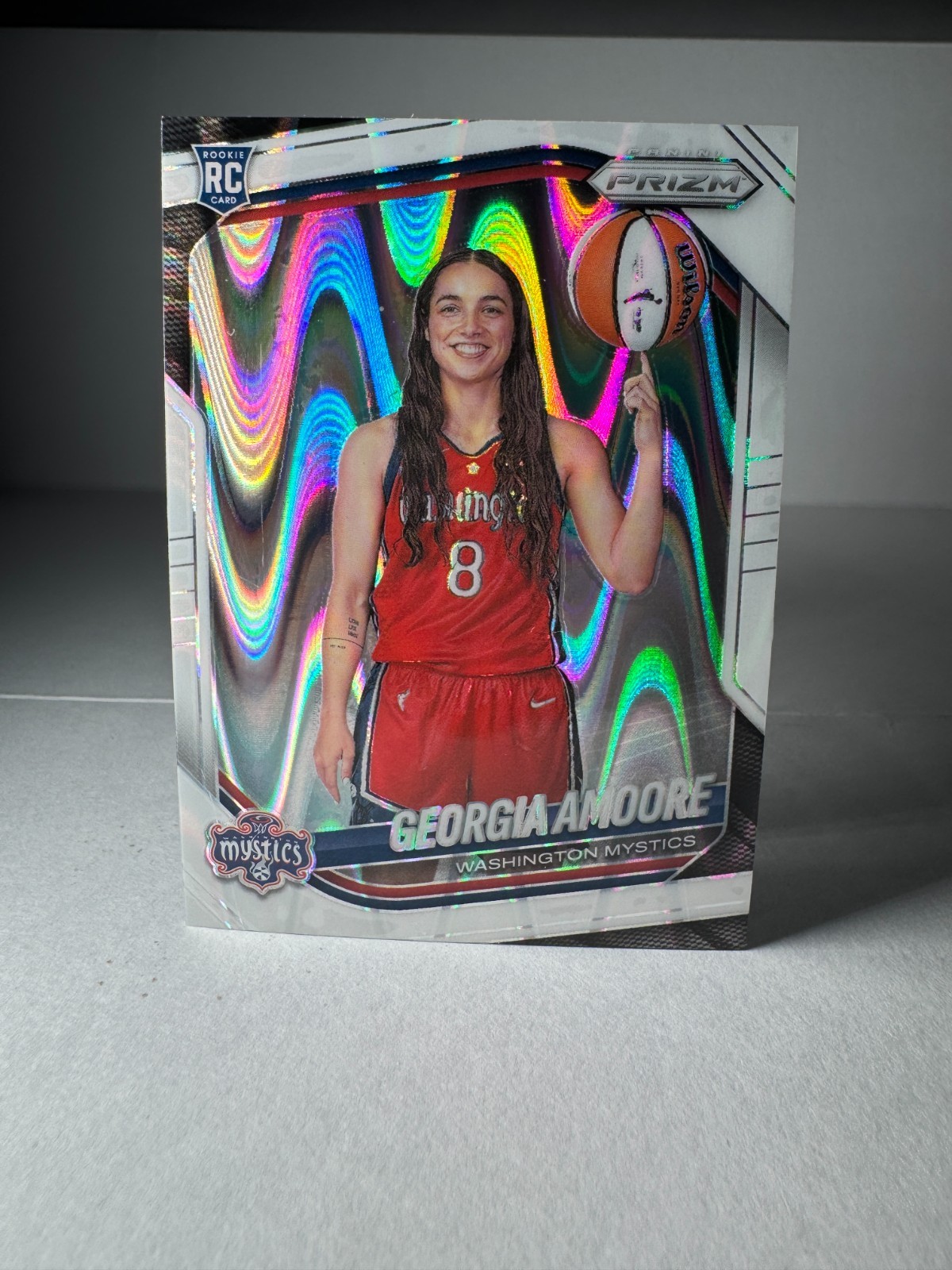 2025 Panini WNBA Prizm White Seismic #140 Georgia Amoore RC Washington Mystics