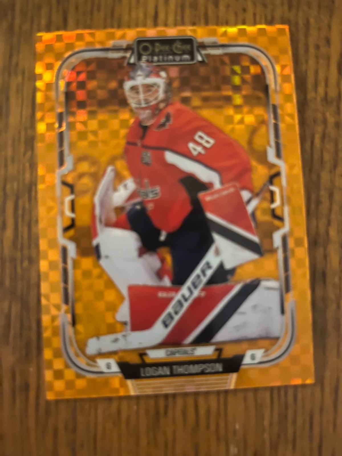 2025/26 LOGAN THOMPSON ORANGE CHECKERS OPC PLATINUM /25