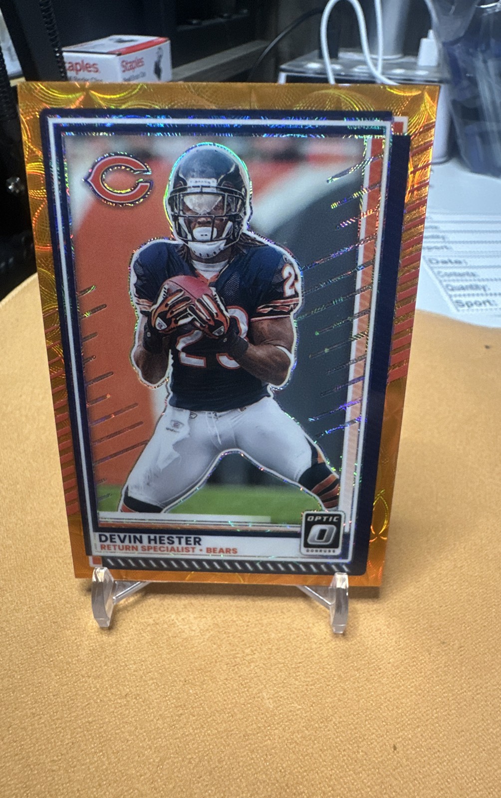 2025 Panini Donruss Optic – Devin Hester #43 Orange Scope Prizm /79