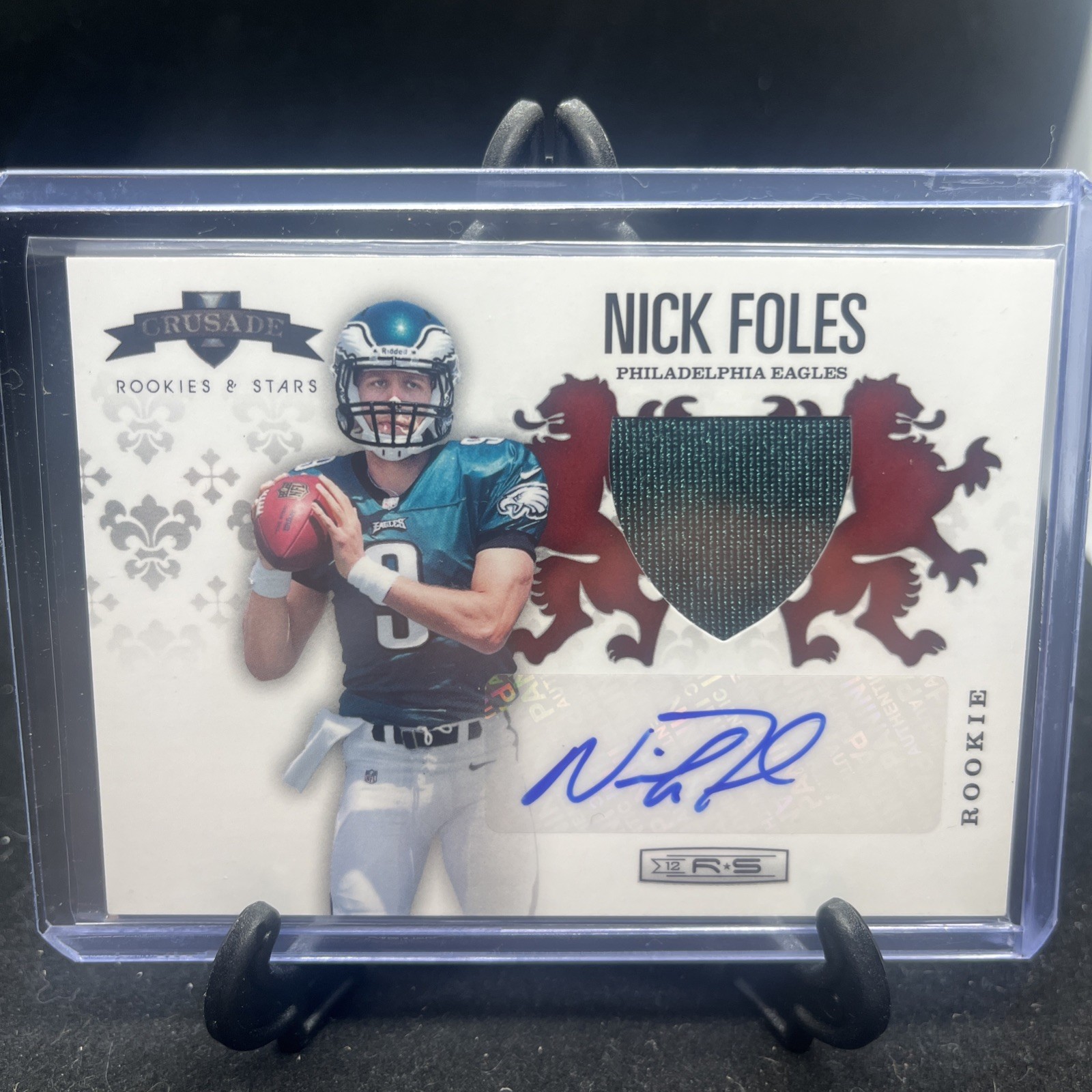 2012 Panini Rookies And Stars Nick Foles No. 14 Crusade Red Foil #/49 RPA