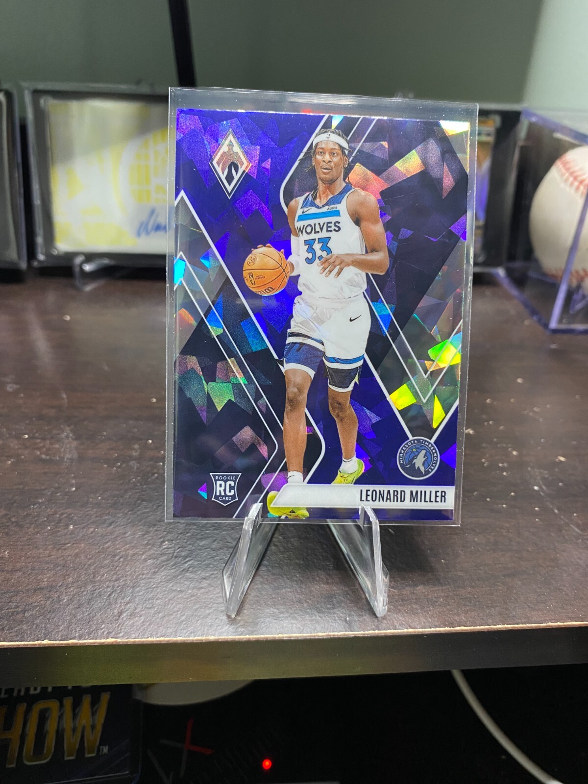 2023-24 Panini Phoenix – Rookies Leonard Miller #259 Blue Ice (RC)