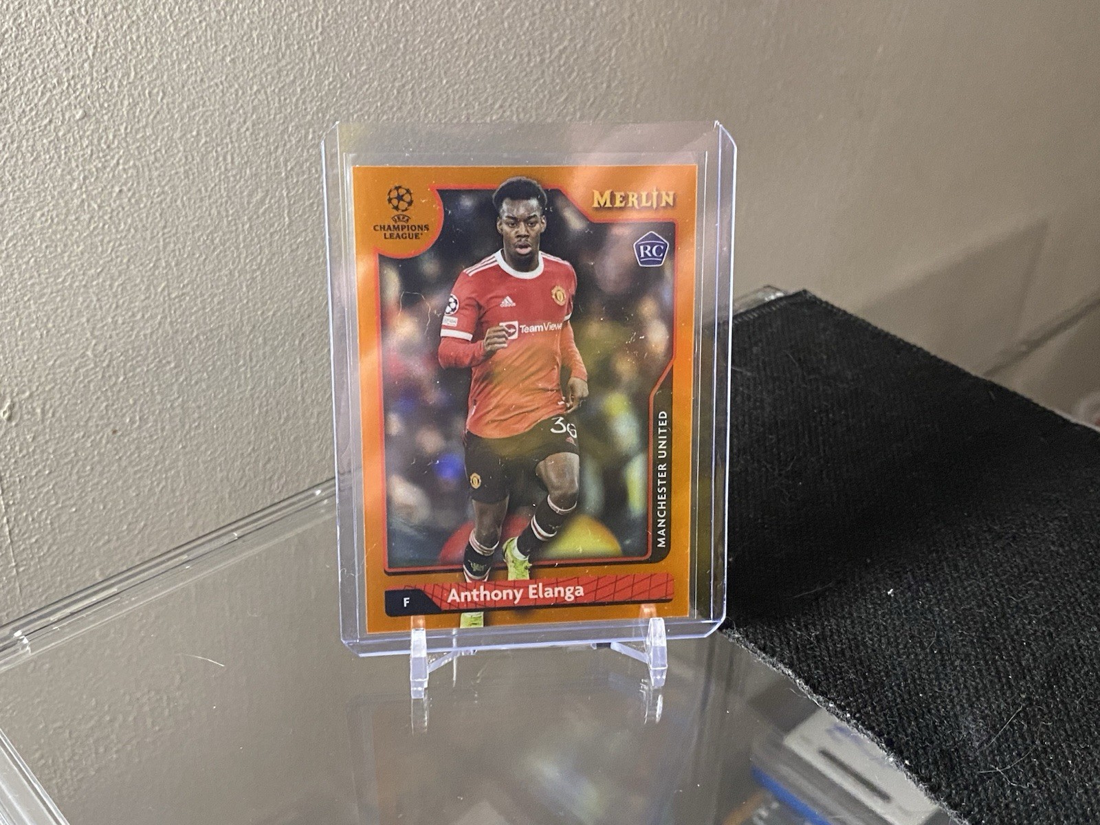 2021-22 Topps Merlin Anthony Elanga Rookie Card Orange Refractor /25 Man United