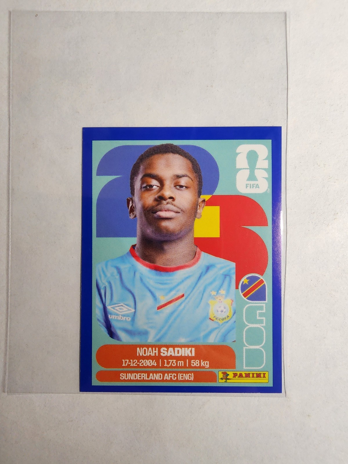 2026 Panini Fifa World Cup 26 – Noah Sadiki #COD 12 Blue Sticker Congo DR