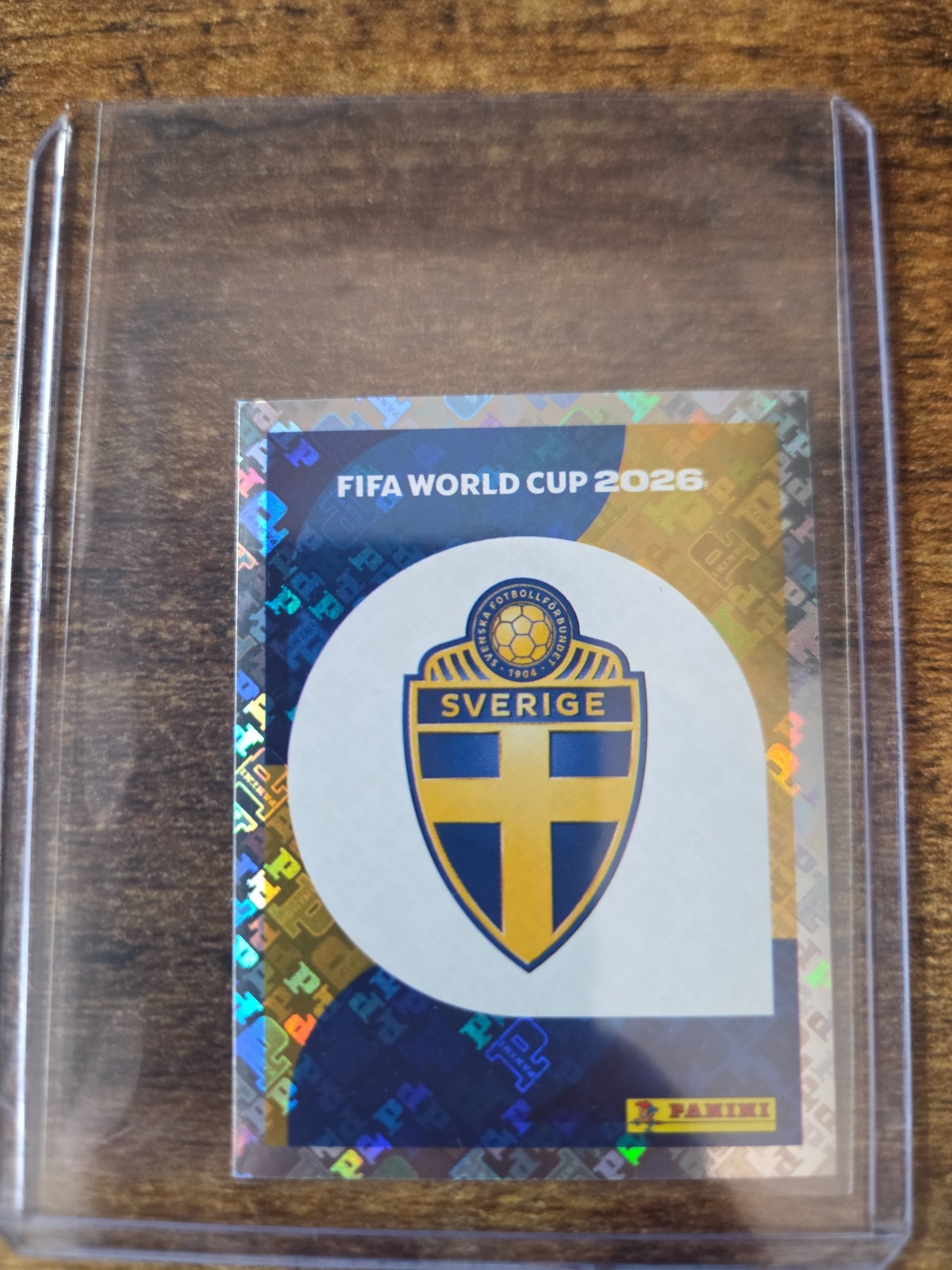2026 Panini FIFA World Cup Stickers – Sweden Team Logo Badge Foil #SWE 1
