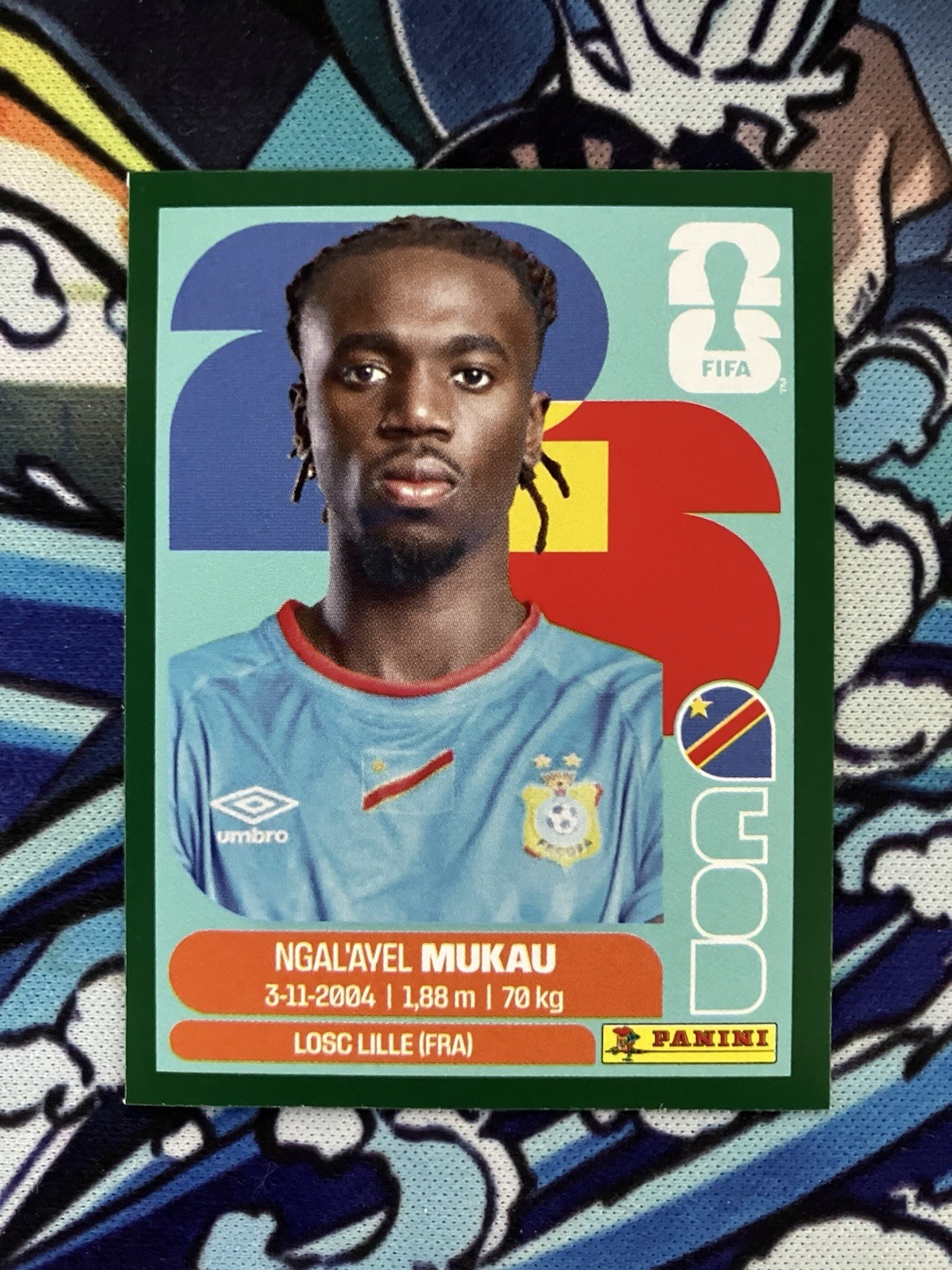 Panini FIFA World Cup Ngal’ayel Mukau Green Border DR Congo Portrait Sticker