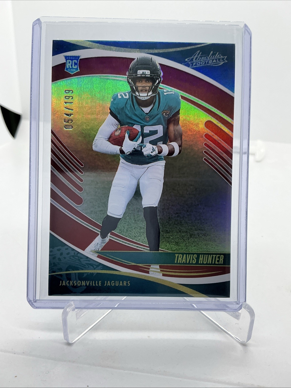 2025 Panini Absolute – Rookies Travis Hunter #186 Spectrum Red /199 (RC)
