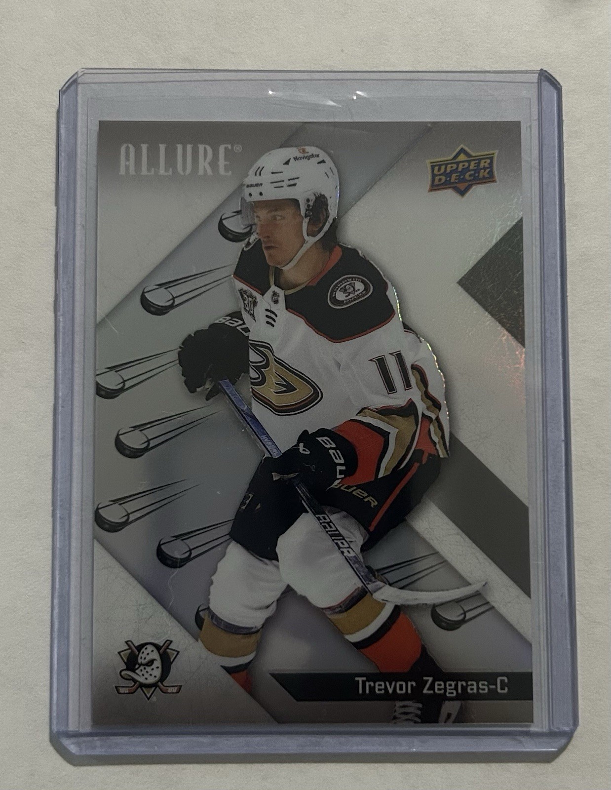 Upper Deck 2024-25 Allure Flying Puck Insert Trevor Zegras #11 Ducks